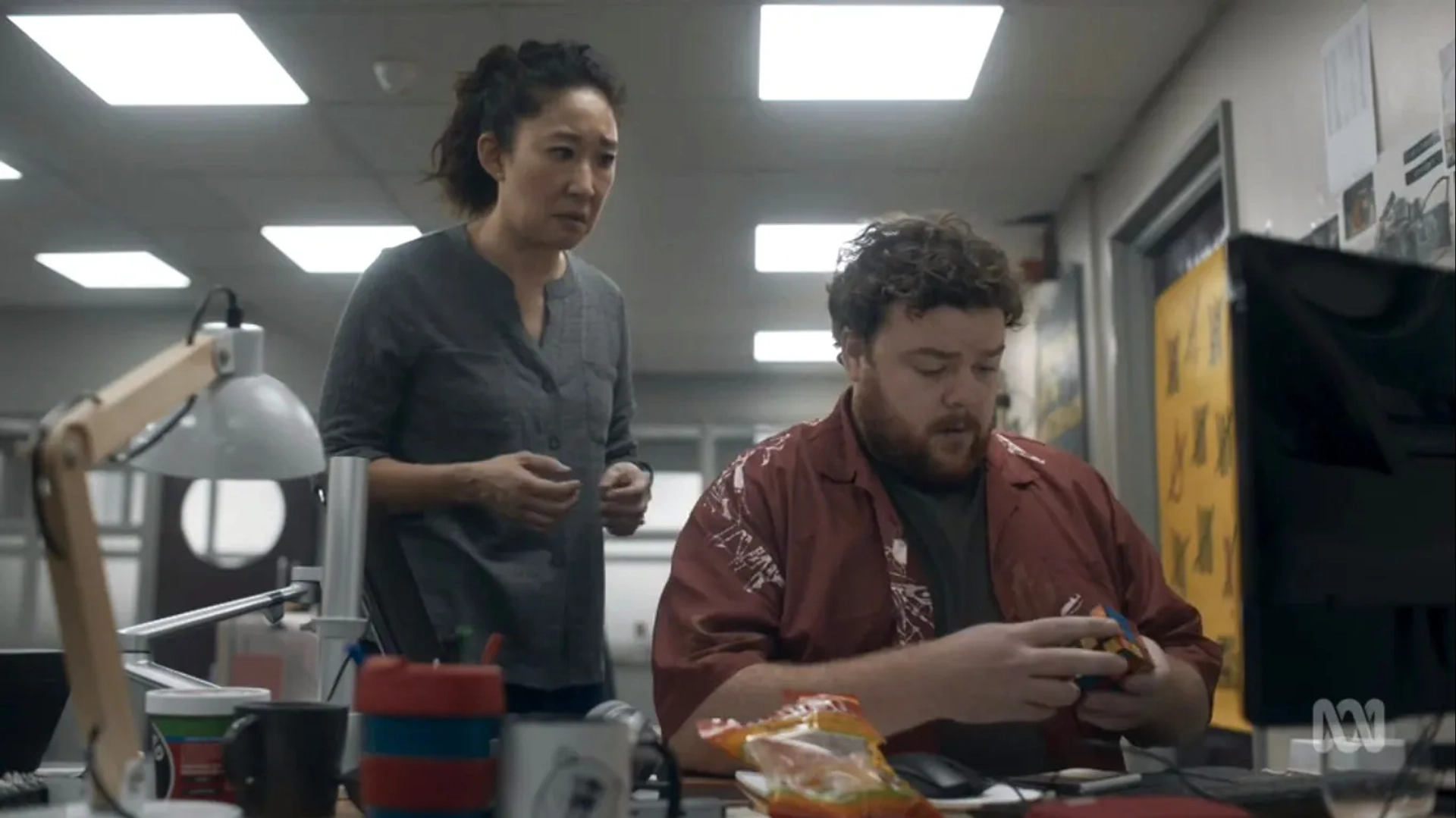 Sandra Oh and Turlough Convery in Killing Eve: Meetings Have Biscuits (2020)