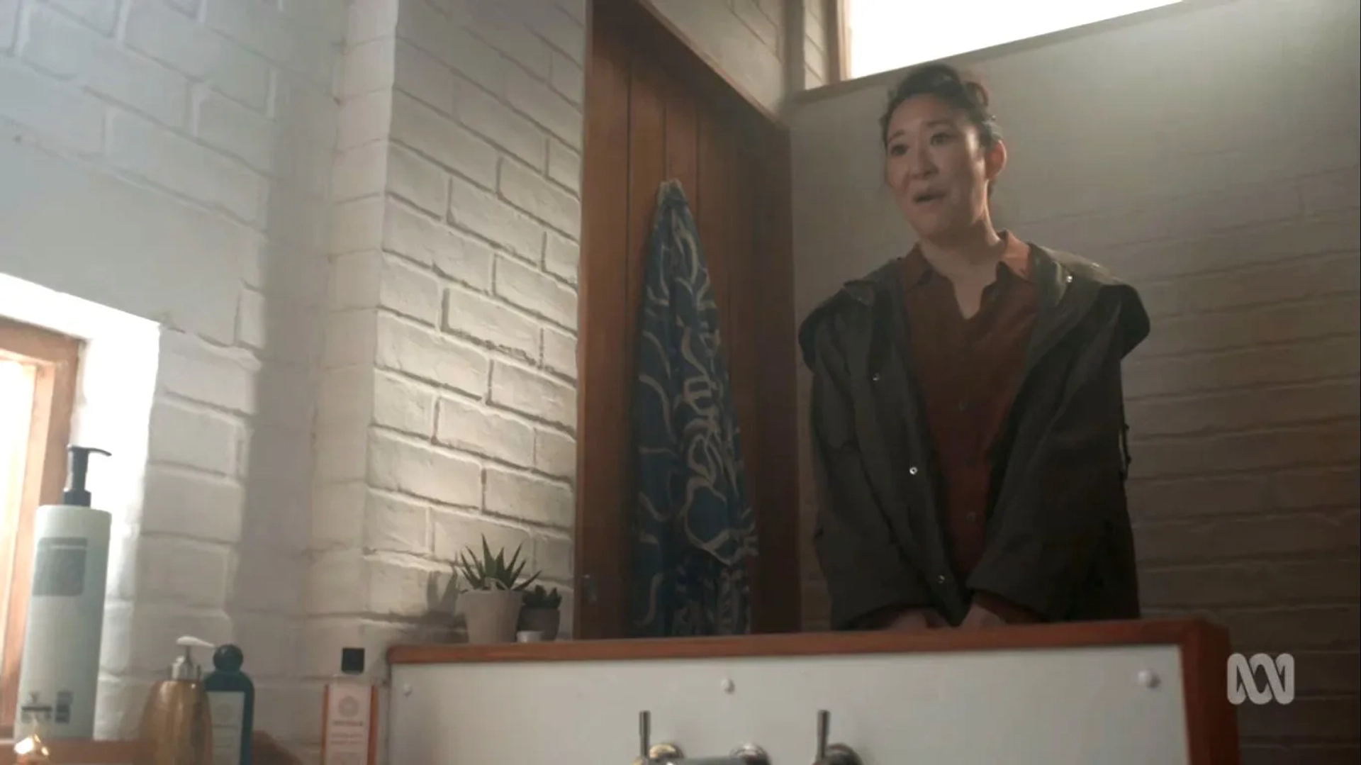 Sandra Oh in Killing Eve: Meetings Have Biscuits (2020)