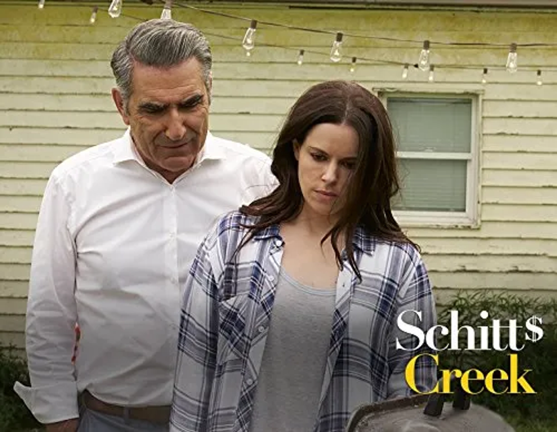 Emily Hampshire and Eugene Levy in Schitt's Creek (2015)