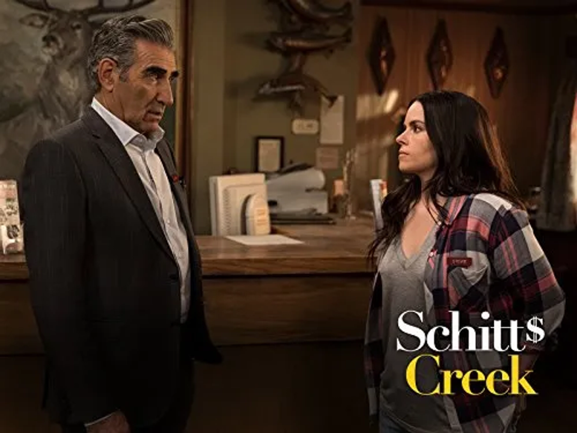 Emily Hampshire and Eugene Levy in Schitt's Creek (2015)