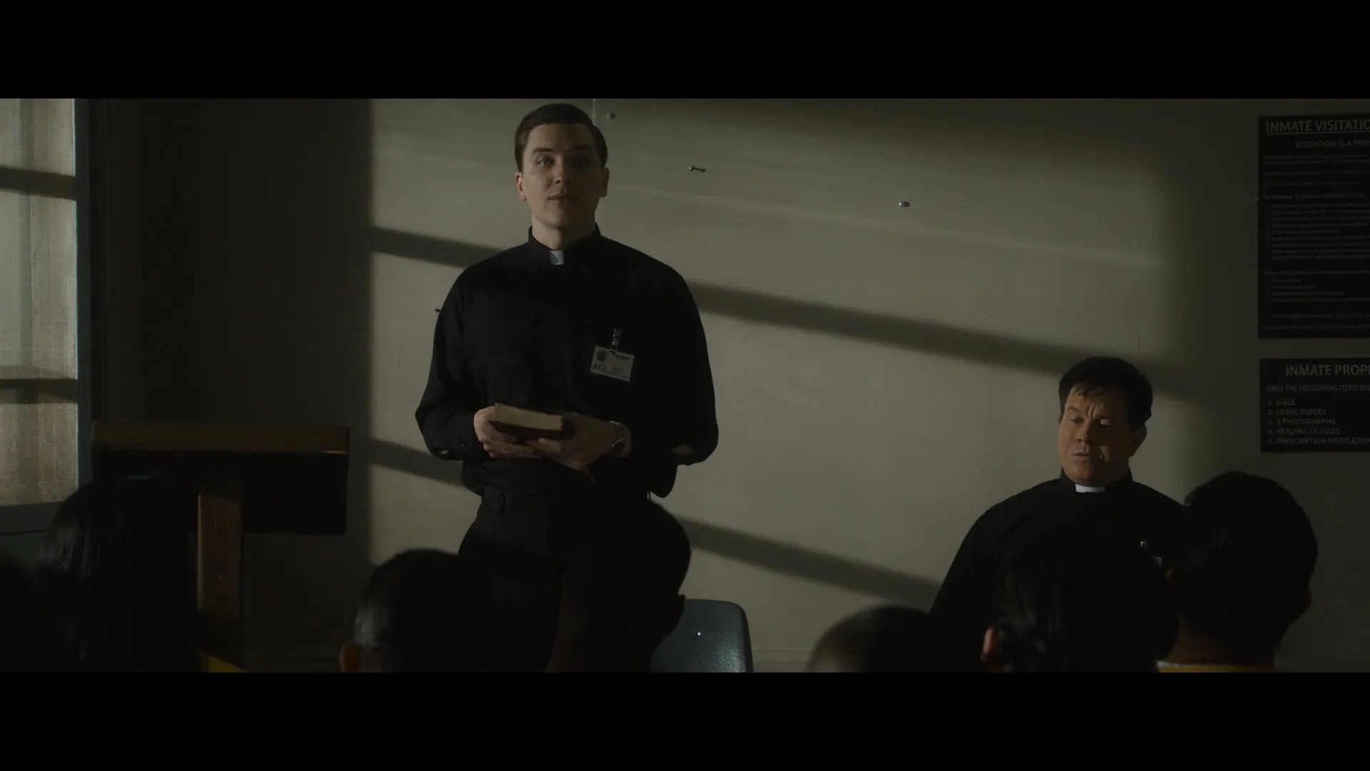 Mark Wahlberg and Cody Fern in Father Stu (2022)