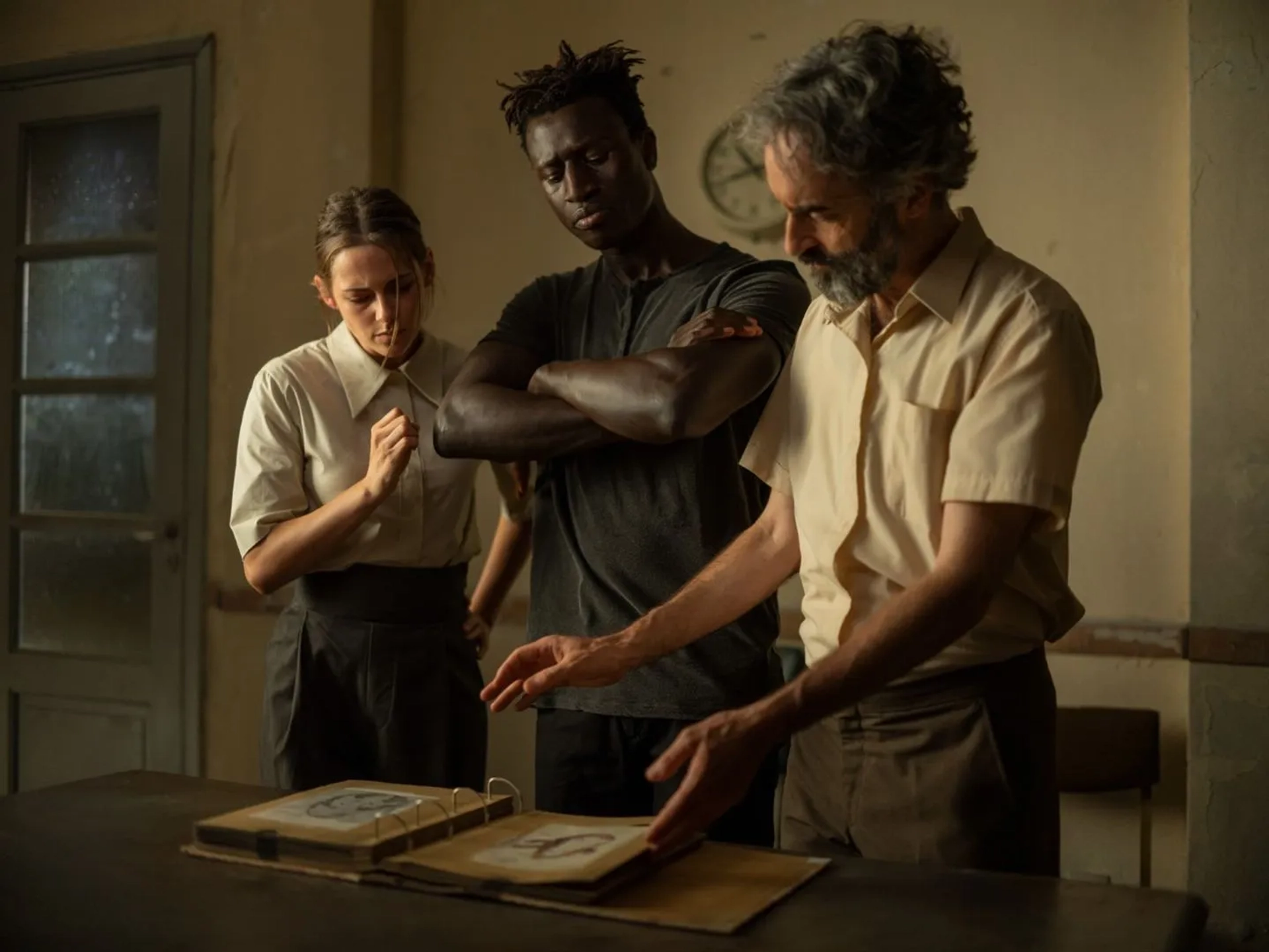 Don McKellar, Kristen Stewart, and Welket Bungué in Crimes of the Future (2022)