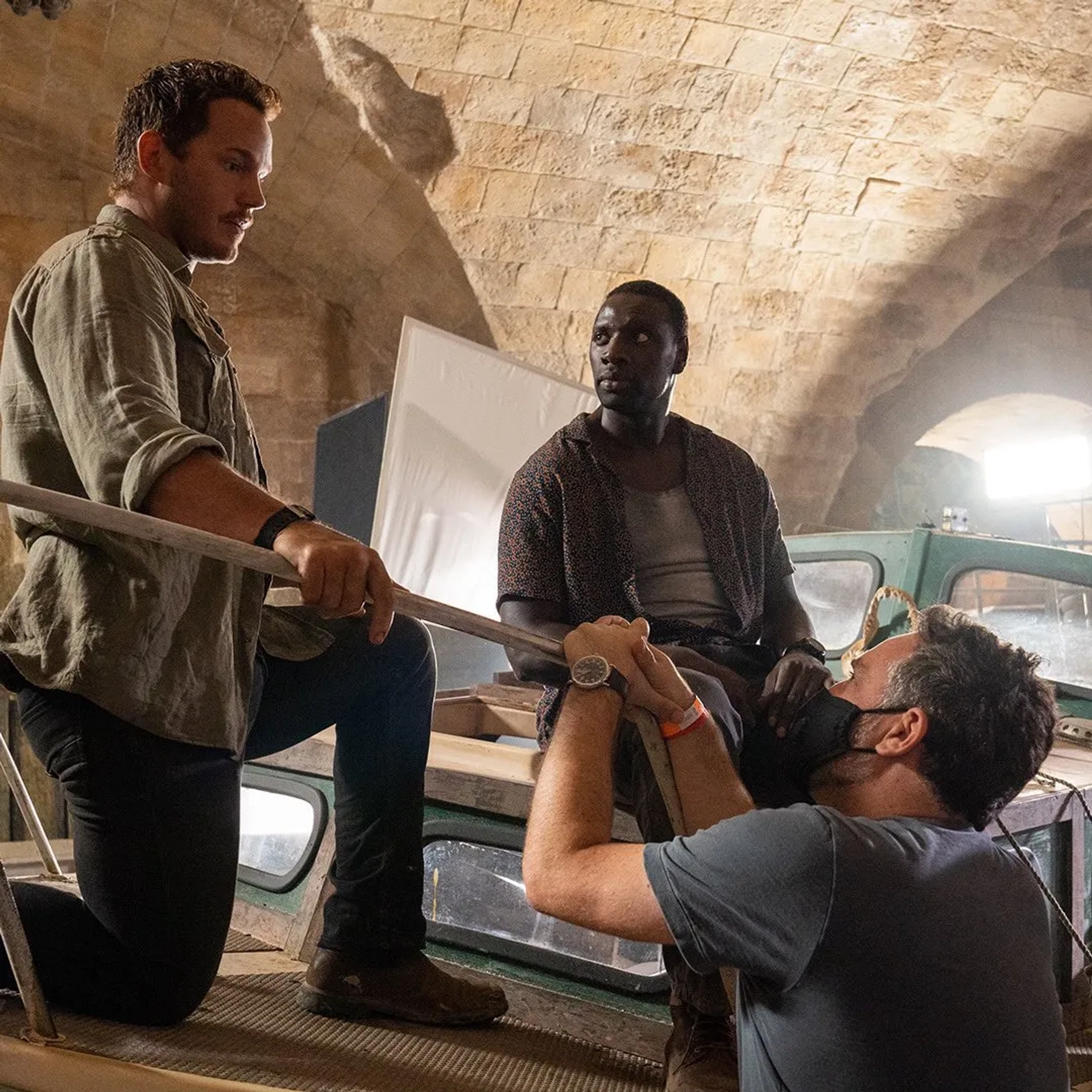 Chris Pratt, Omar Sy, and Colin Trevorrow in Jurassic World Dominion (2022)