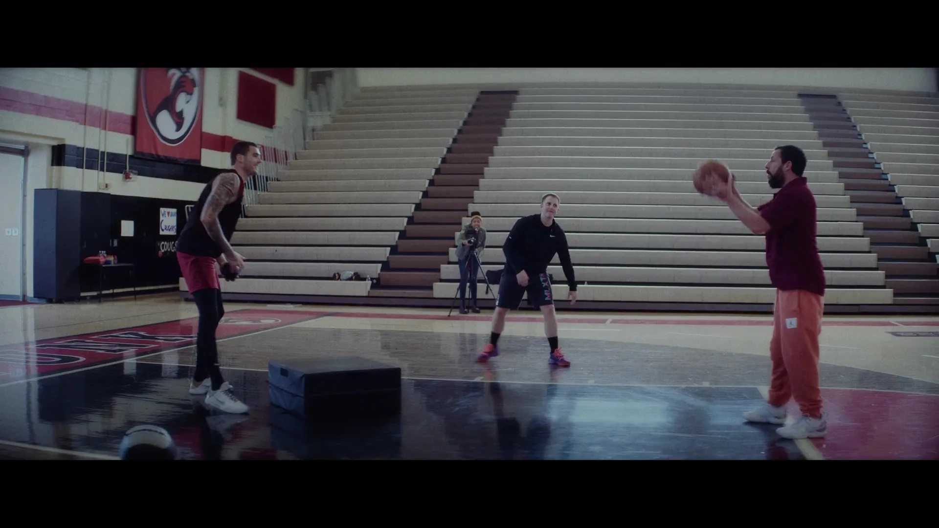 Adam Sandler and Juancho Hernangomez in Hustle (2022)