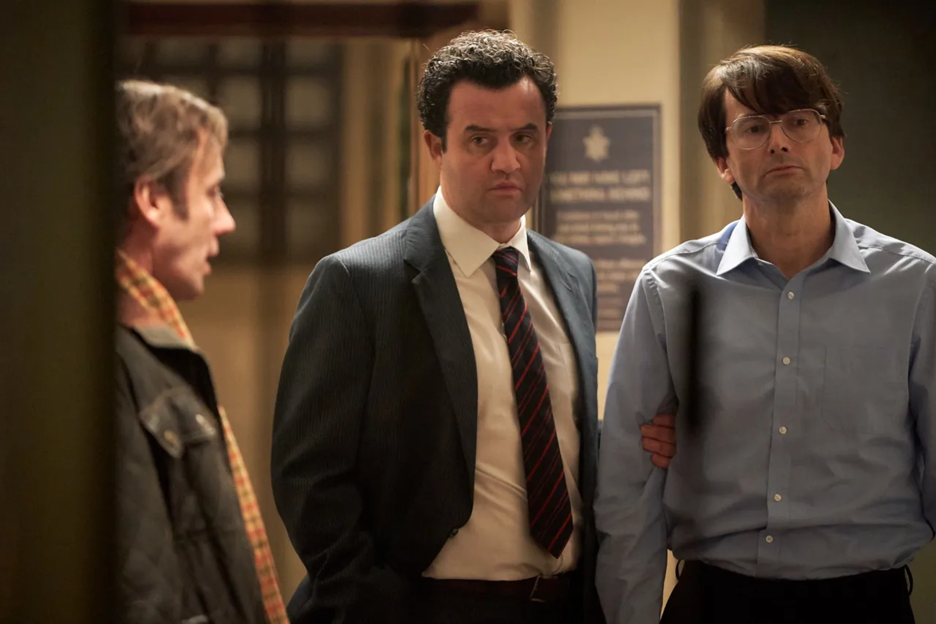 Jay Simpson, David Tennant, and Daniel Mays in Des (2020)