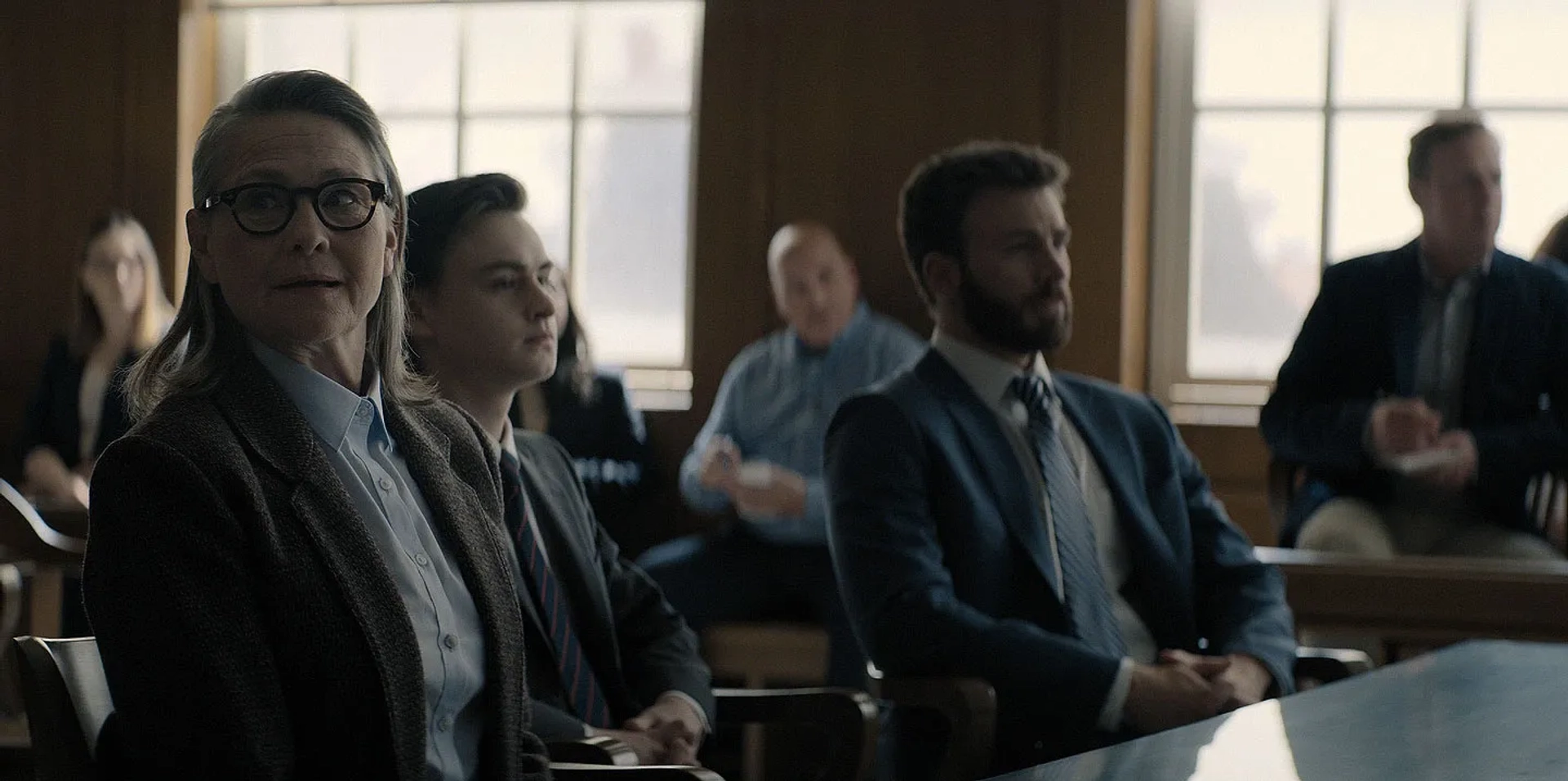 Chris Evans, Cherry Jones, and Jaeden Martell in Defending Jacob (2020)