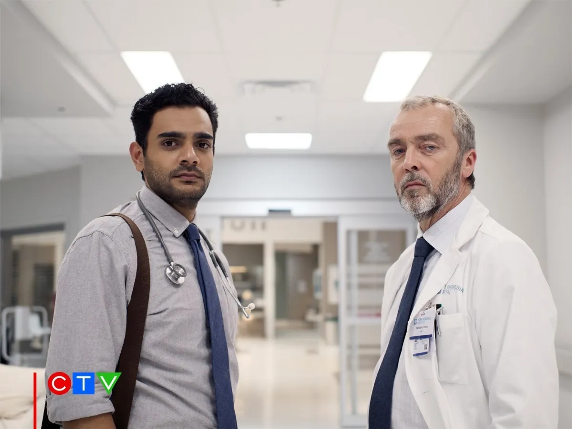 John Hannah and Hamza Haq in Transplant (2020)