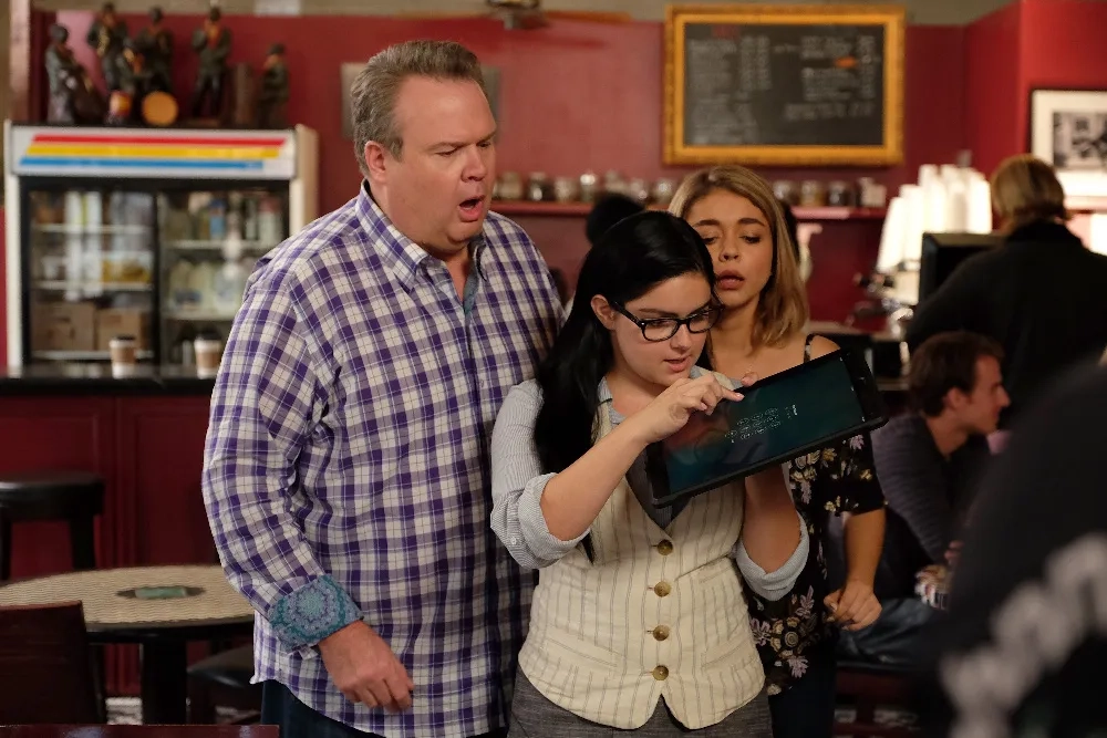 Sarah Hyland, Eric Stonestreet, and Ariel Winter in Modern Family (2009)