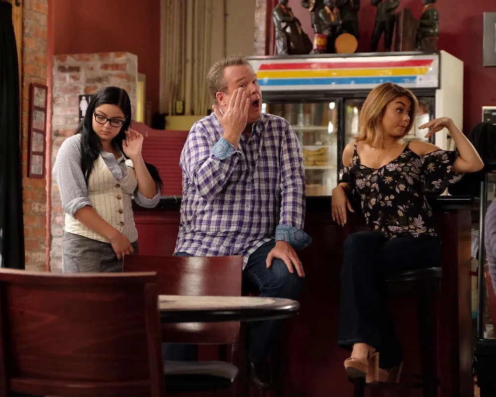Sarah Hyland, Eric Stonestreet, and Ariel Winter in Modern Family (2009)