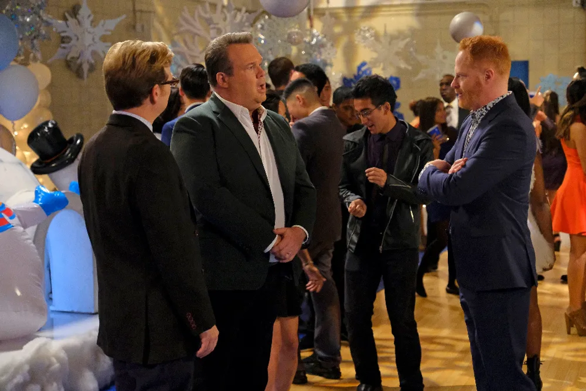 Andy Daly, Jesse Tyler Ferguson, and Eric Stonestreet in Modern Family (2009)