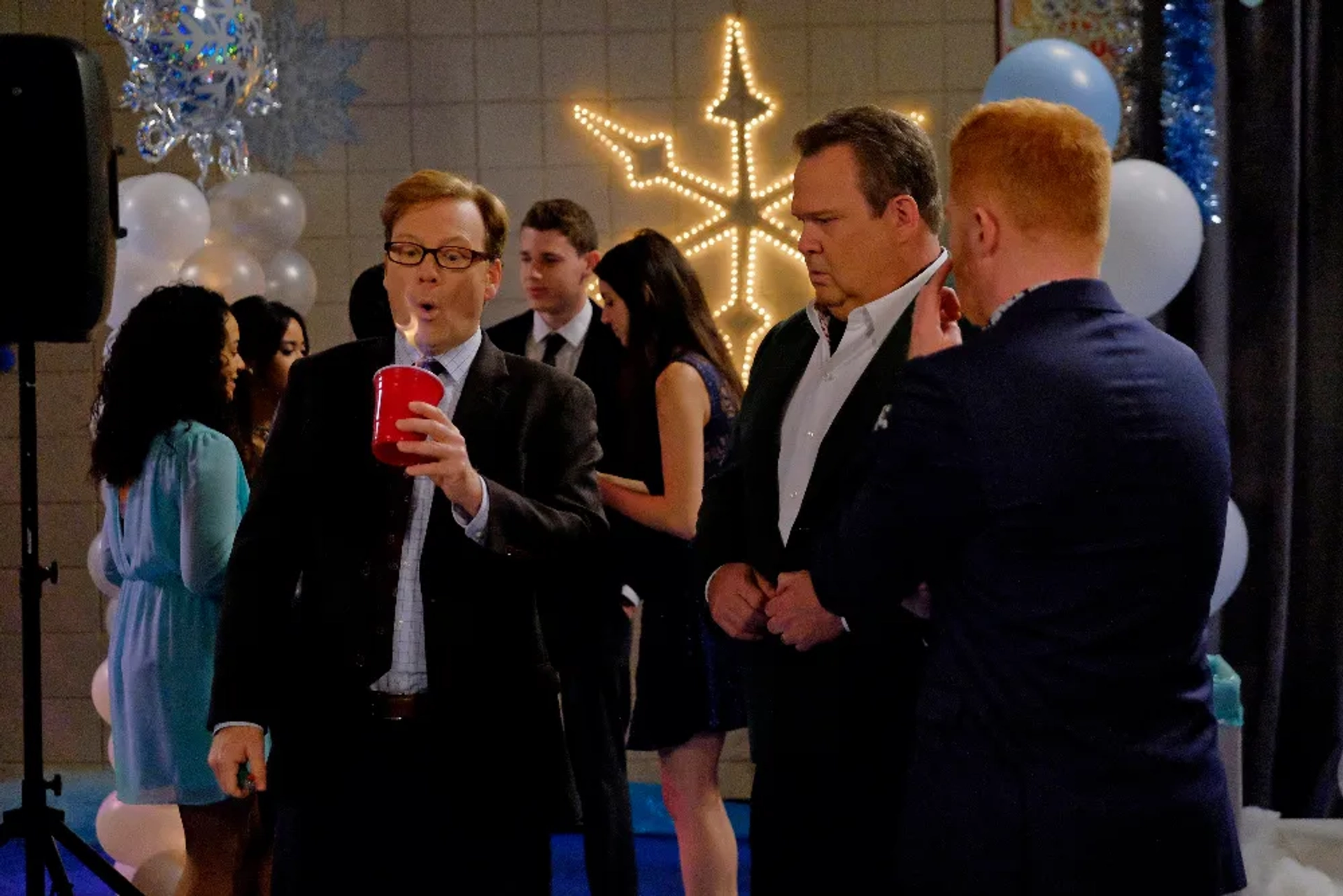 Andy Daly, Jesse Tyler Ferguson, and Eric Stonestreet in Modern Family (2009)