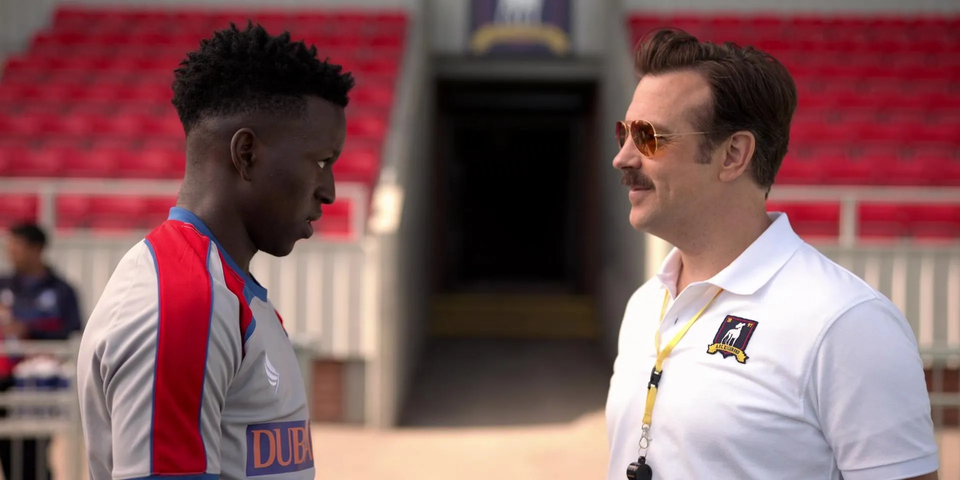 Jason Sudeikis and Toheeb Jimoh in Ted Lasso (2020)