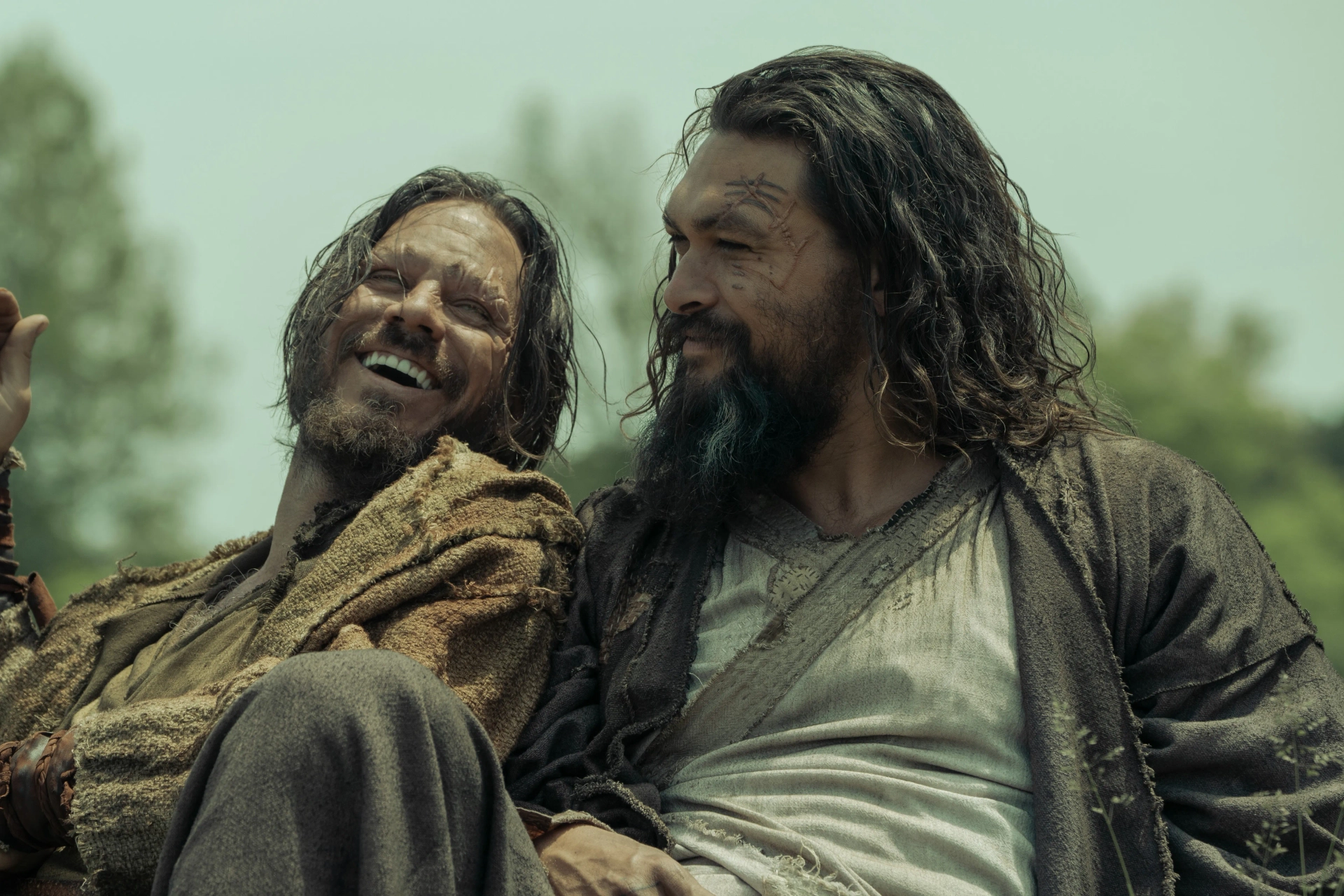 Jason Momoa and Michael Raymond-James in See: Heavy Hangs the Head (2022)