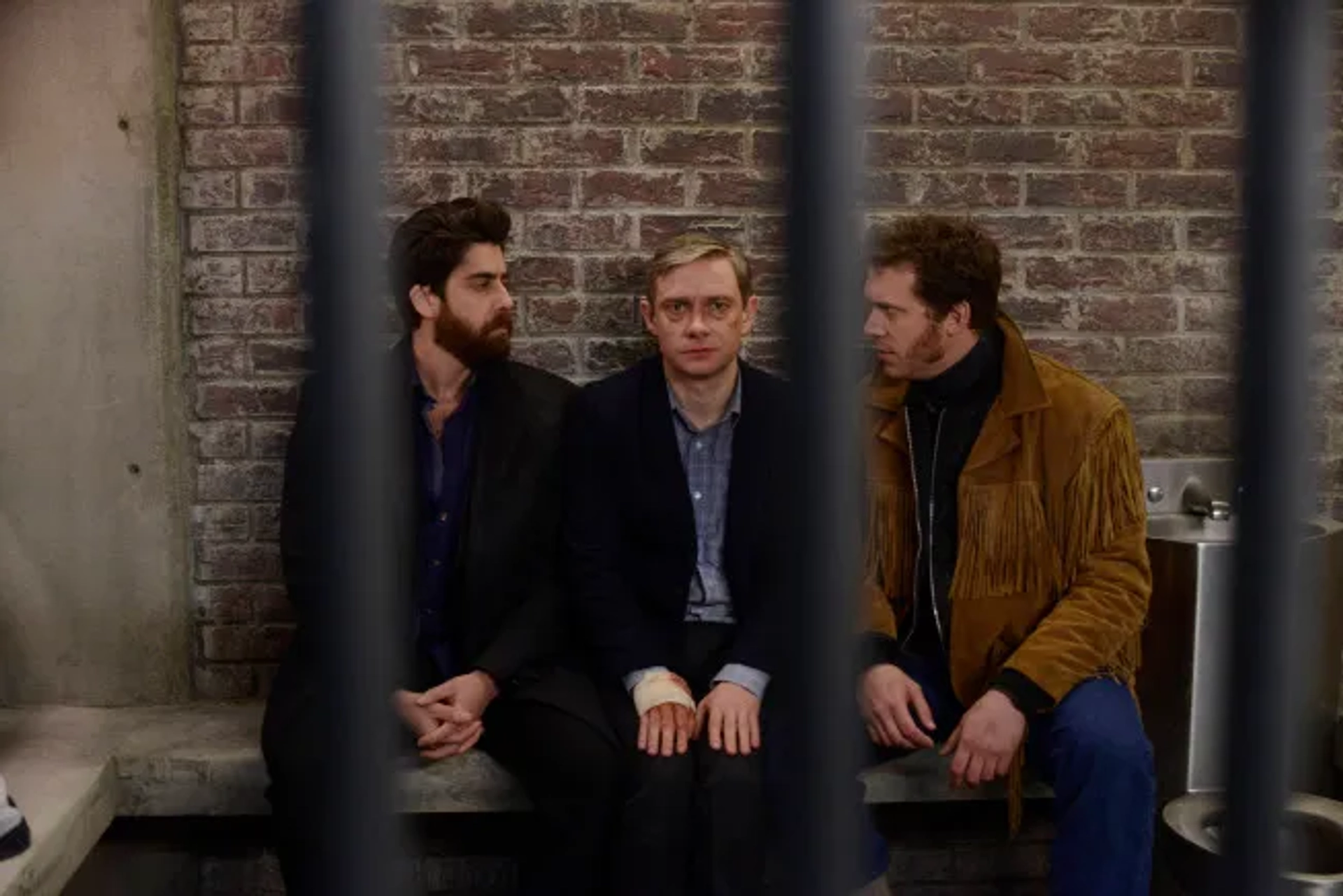 Adam Goldberg, Martin Freeman, and Russell Harvard in Fargo (2014)