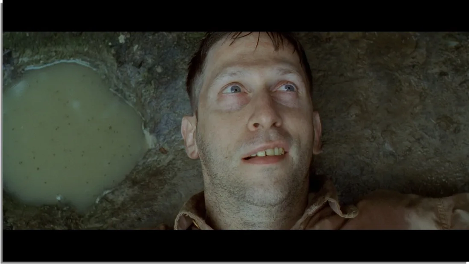 Tim Blake Nelson in O Brother, Where Art Thou? (2000)