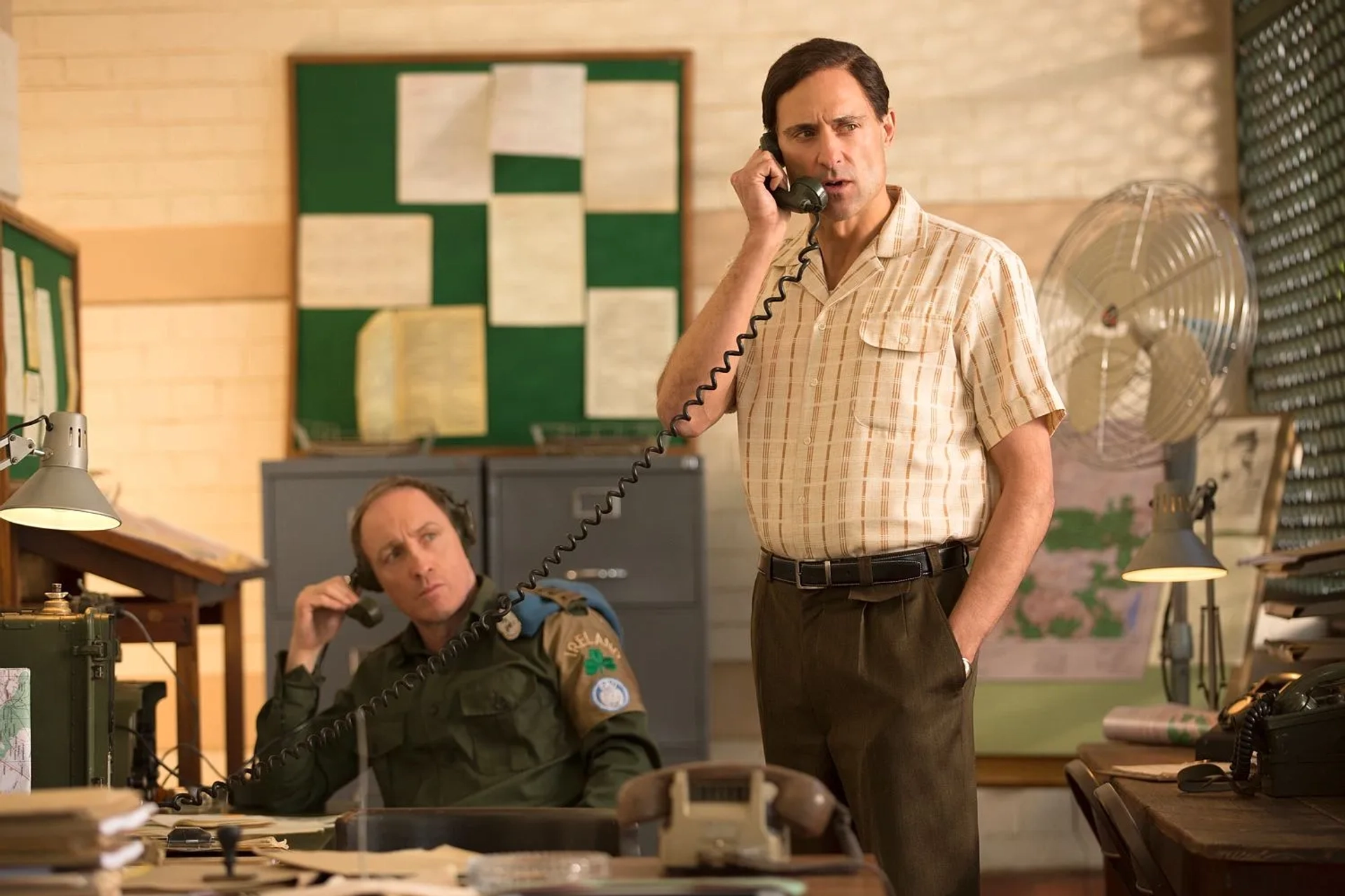 Michael McElhatton and Mark Strong in The Siege of Jadotville (2016)