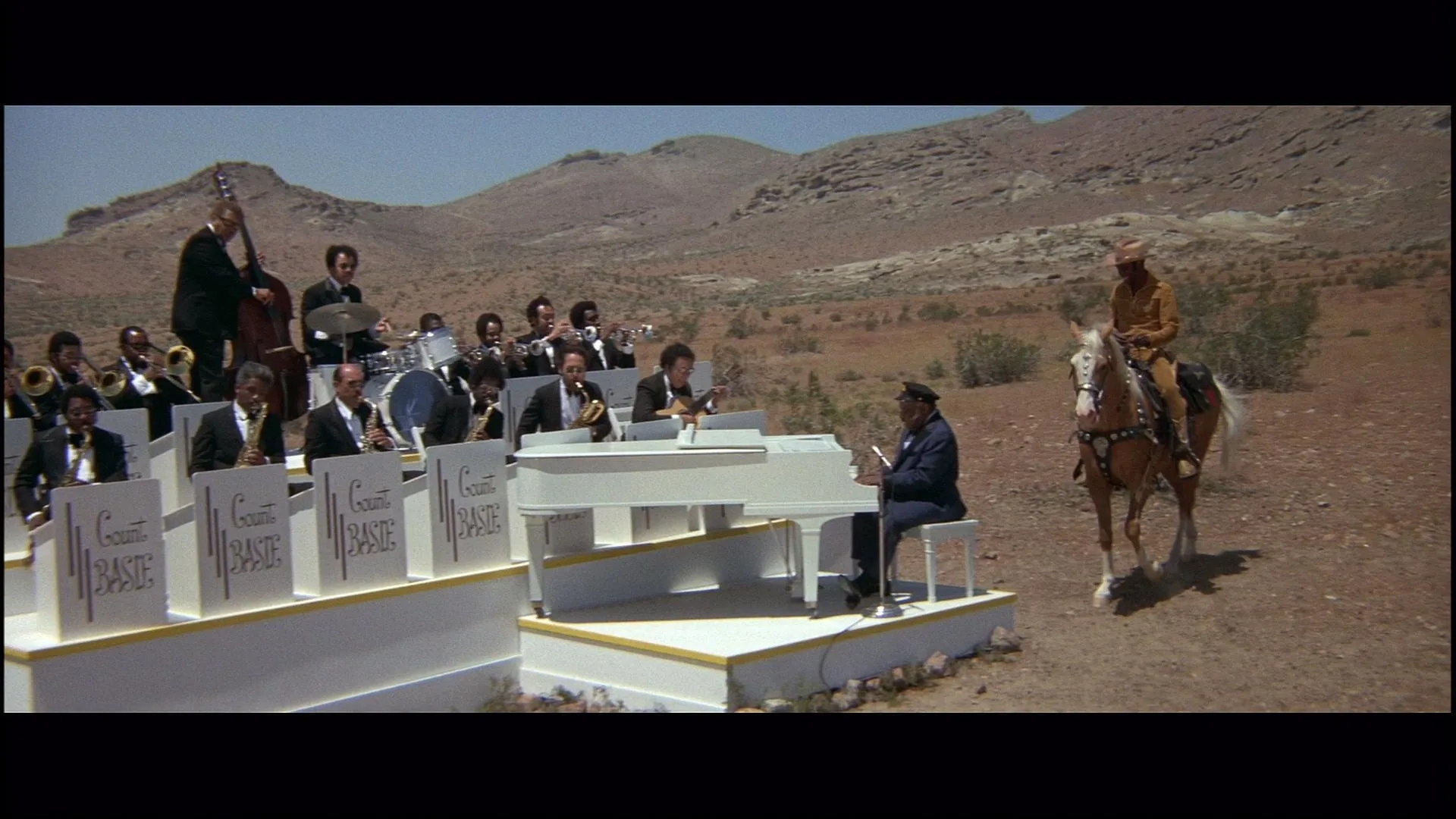 Cleavon Little and Count Basie in Blazing Saddles (1974)