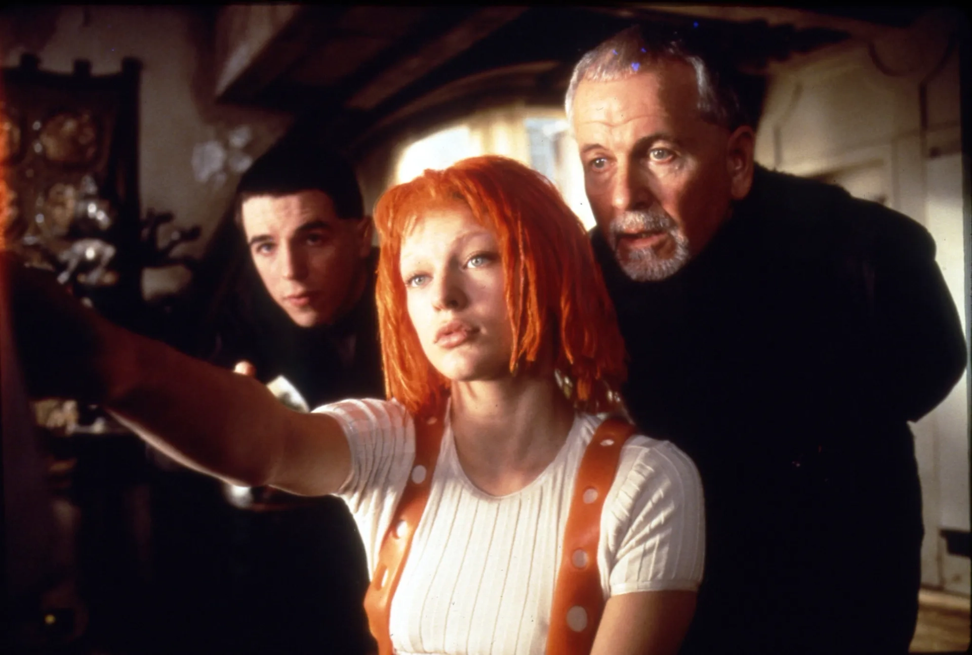 Milla Jovovich, Ian Holm, and Charlie Creed-Miles in The Fifth Element (1997)