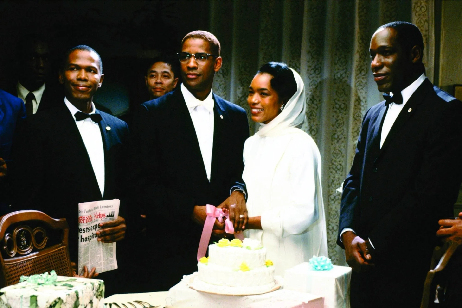 Denzel Washington, Angela Bassett, James McDaniel, and Ernest Thomas in Malcolm X (1992)