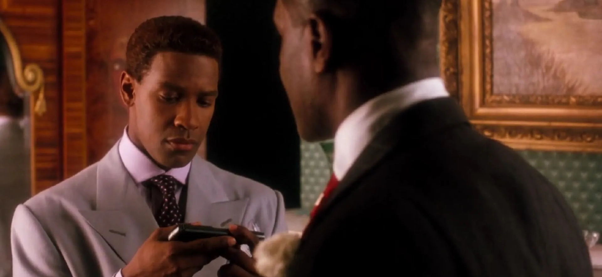 Denzel Washington and Delroy Lindo in Malcolm X (1992)