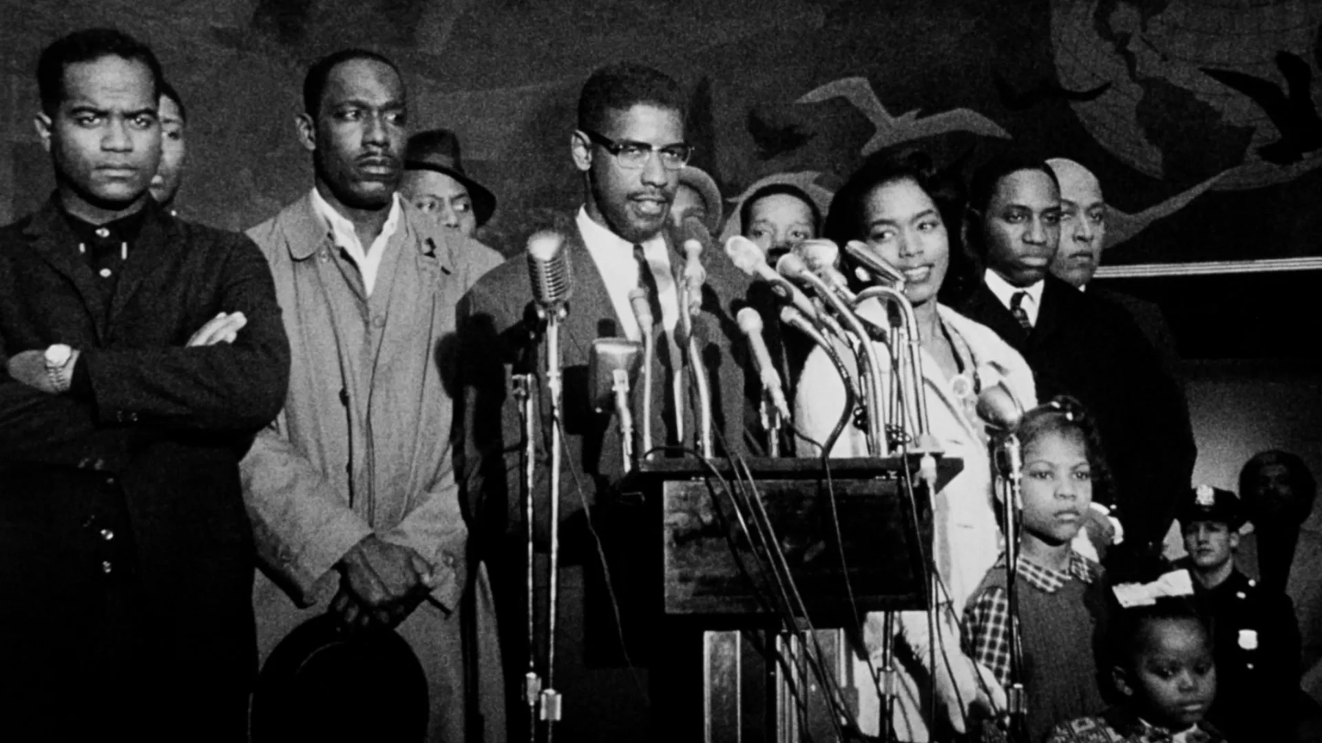 Denzel Washington, Angela Bassett, and James McDaniel in Malcolm X (1992)