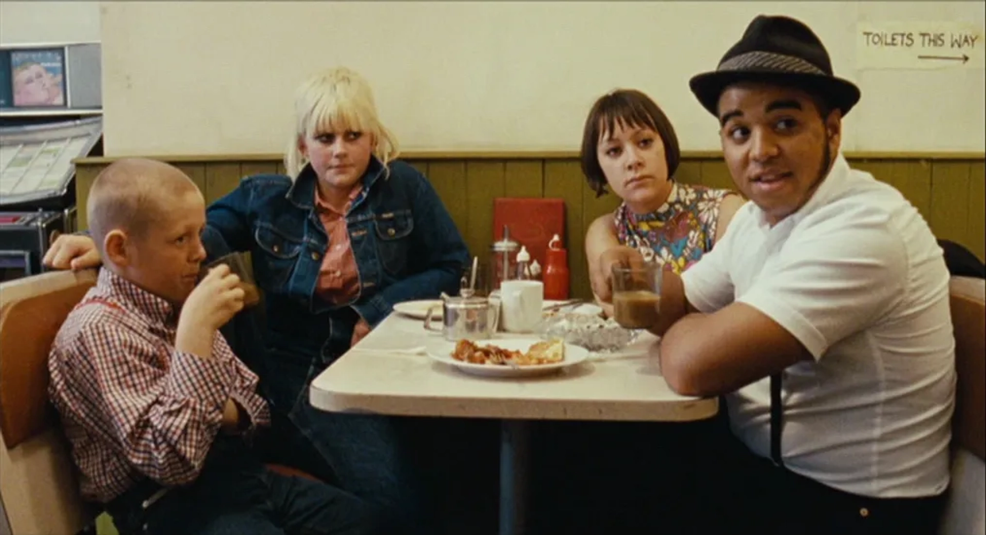 Andrew Shim, Danielle Watson, and Thomas Turgoose in This Is England (2006)