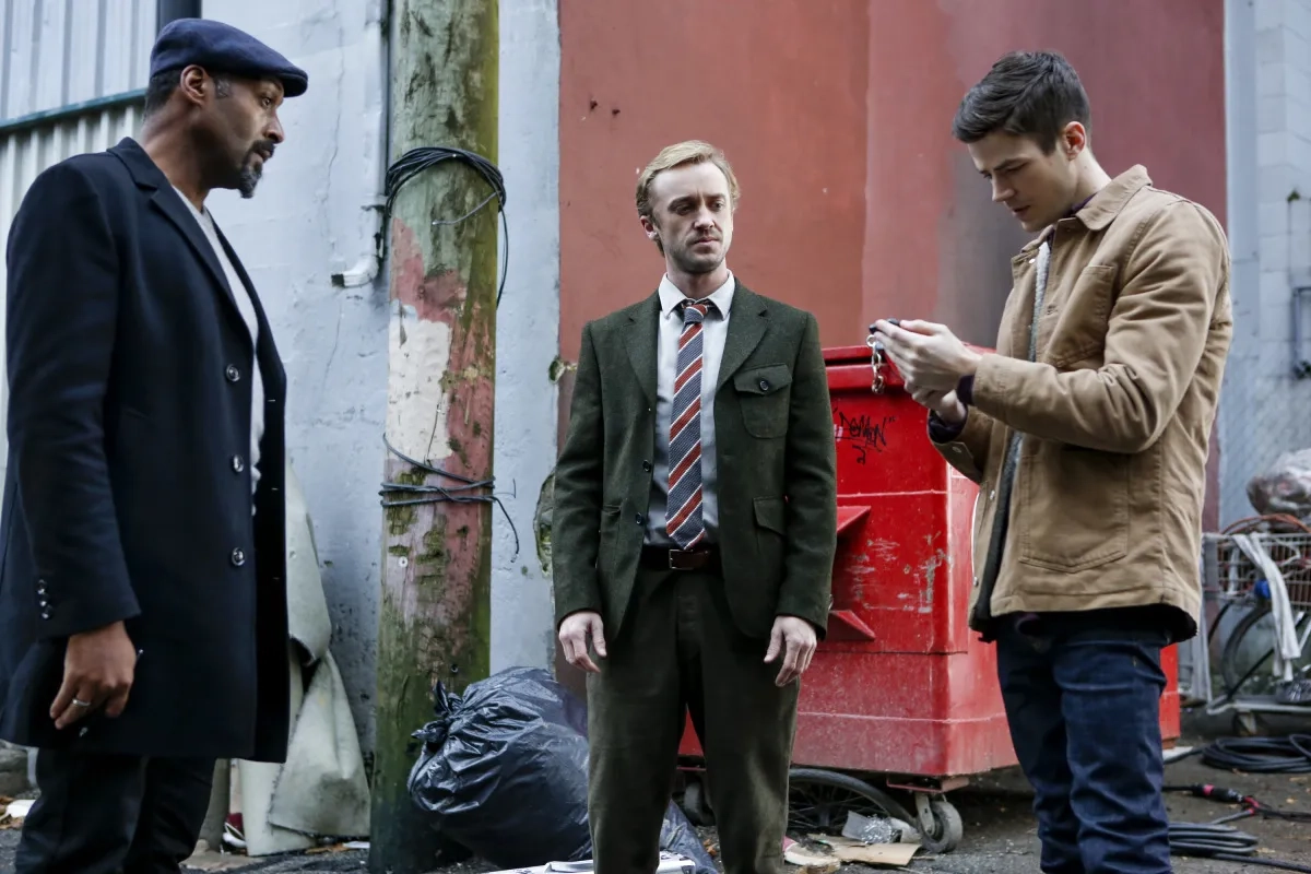 Tom Felton, Jesse L. Martin, and Grant Gustin in The Flash (2014)