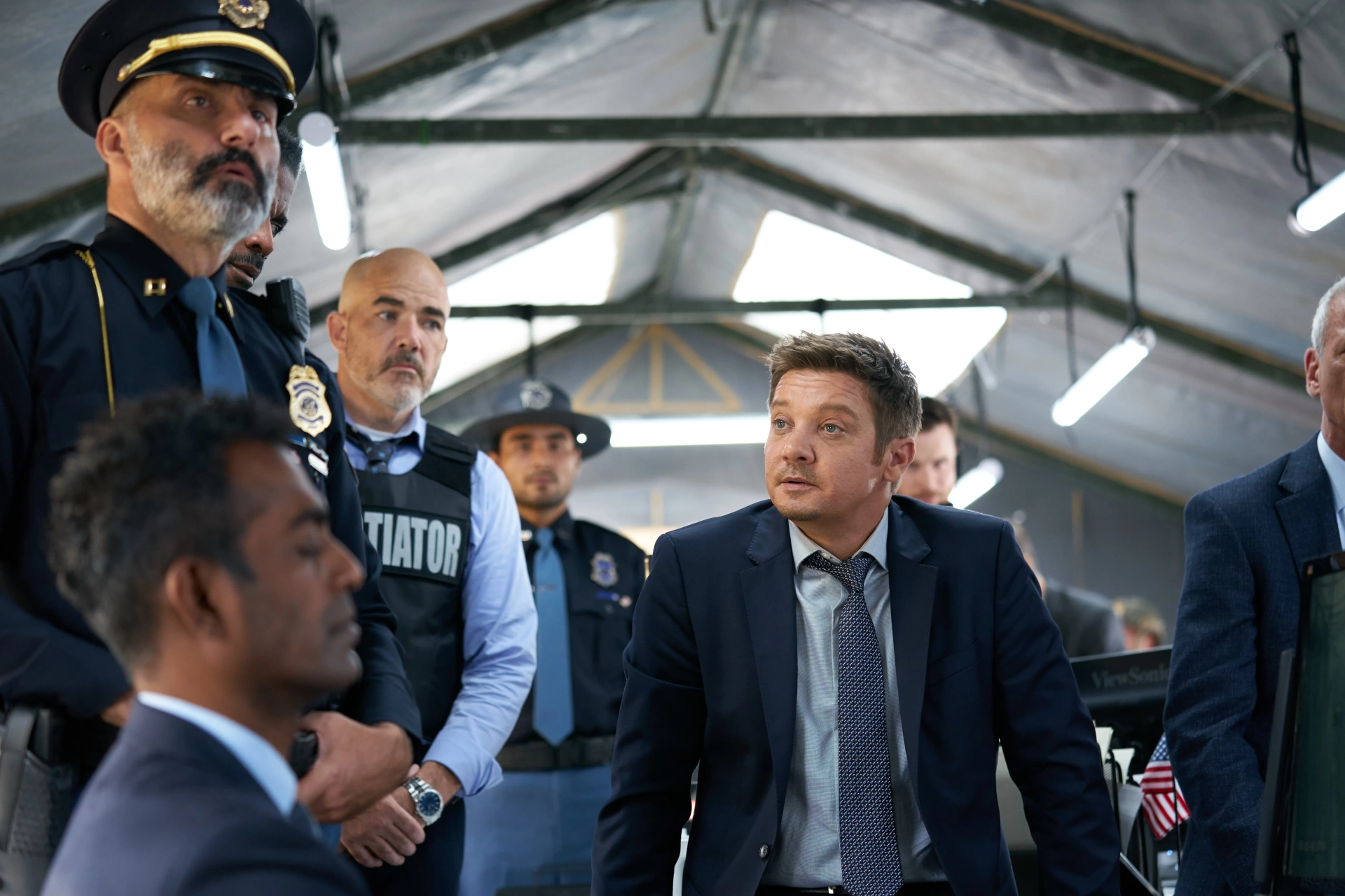 Michael Friedman and Jeremy Renner in Mayor of Kingstown (2021)