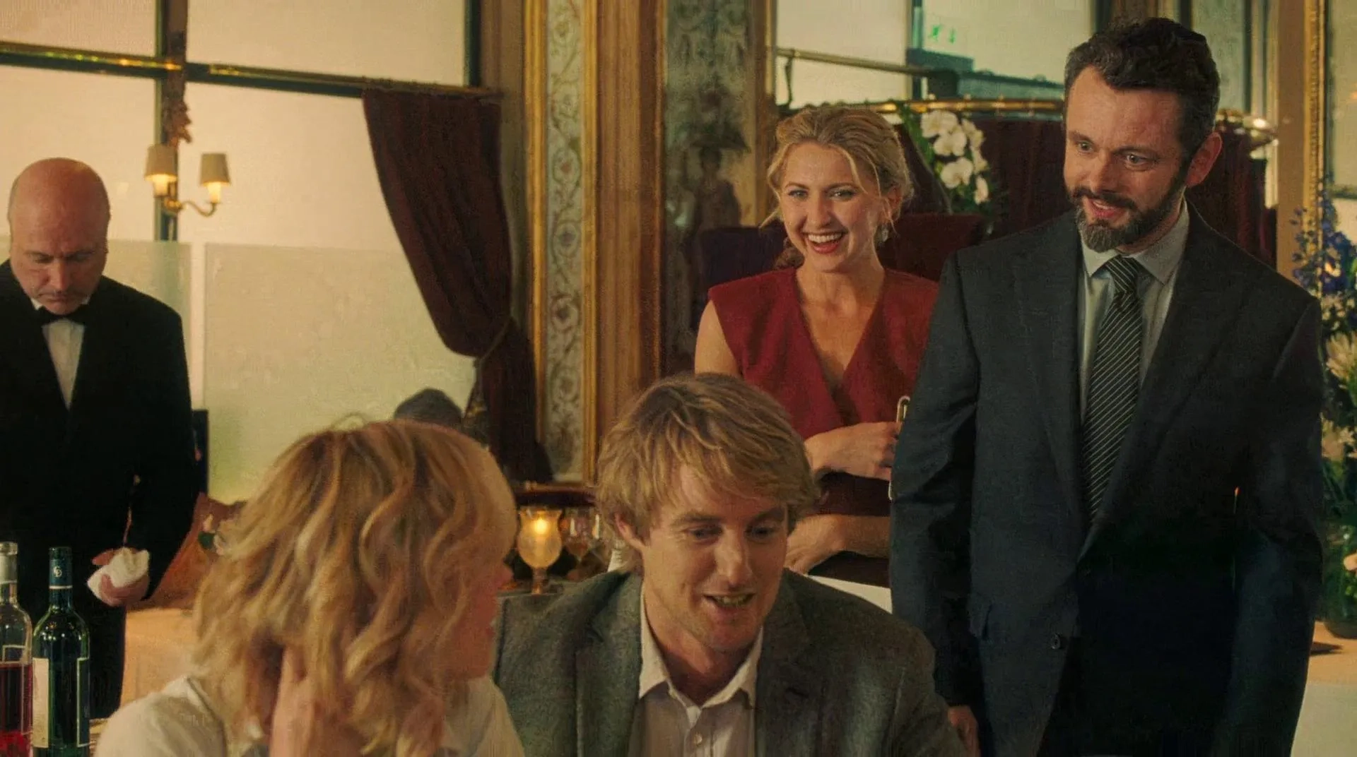 Owen Wilson, Michael Sheen, Rachel McAdams, and Nina Arianda in Midnight in Paris (2011)