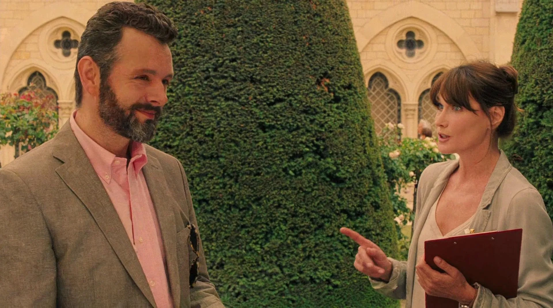 Carla Bruni and Michael Sheen in Midnight in Paris (2011)