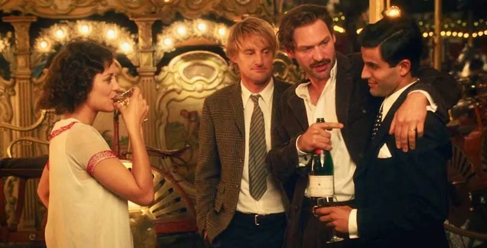 Owen Wilson, Marion Cotillard, Corey Stoll, and Daniel Lundh in Midnight in Paris (2011)