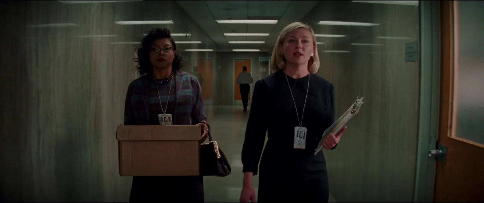 Kirsten Dunst and Taraji P. Henson in Hidden Figures (2016)