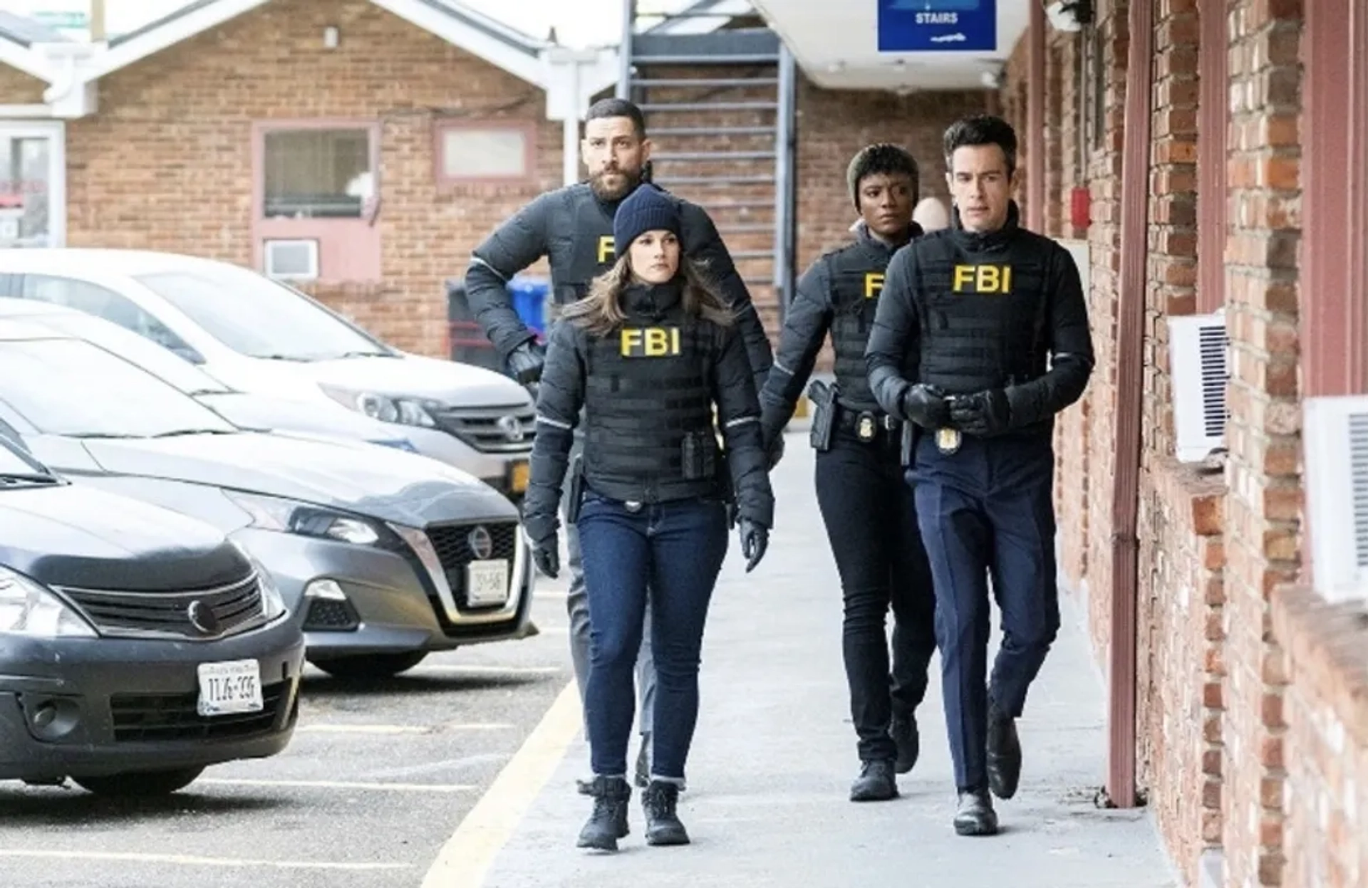 Missy Peregrym, John Boyd, Katherine Renee Kane, and Zeeko Zaki in FBI: The Lies We Tell (2023)