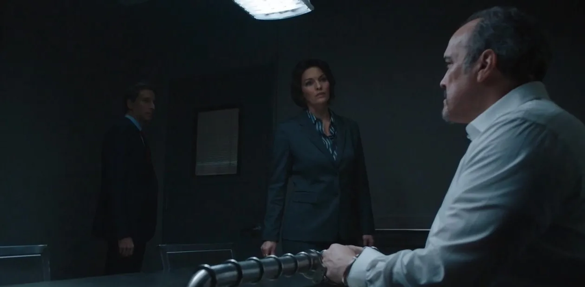 Ben Shenkman, David Zayas, and Alana De La Garza in FBI: Liar's Poker (2020)