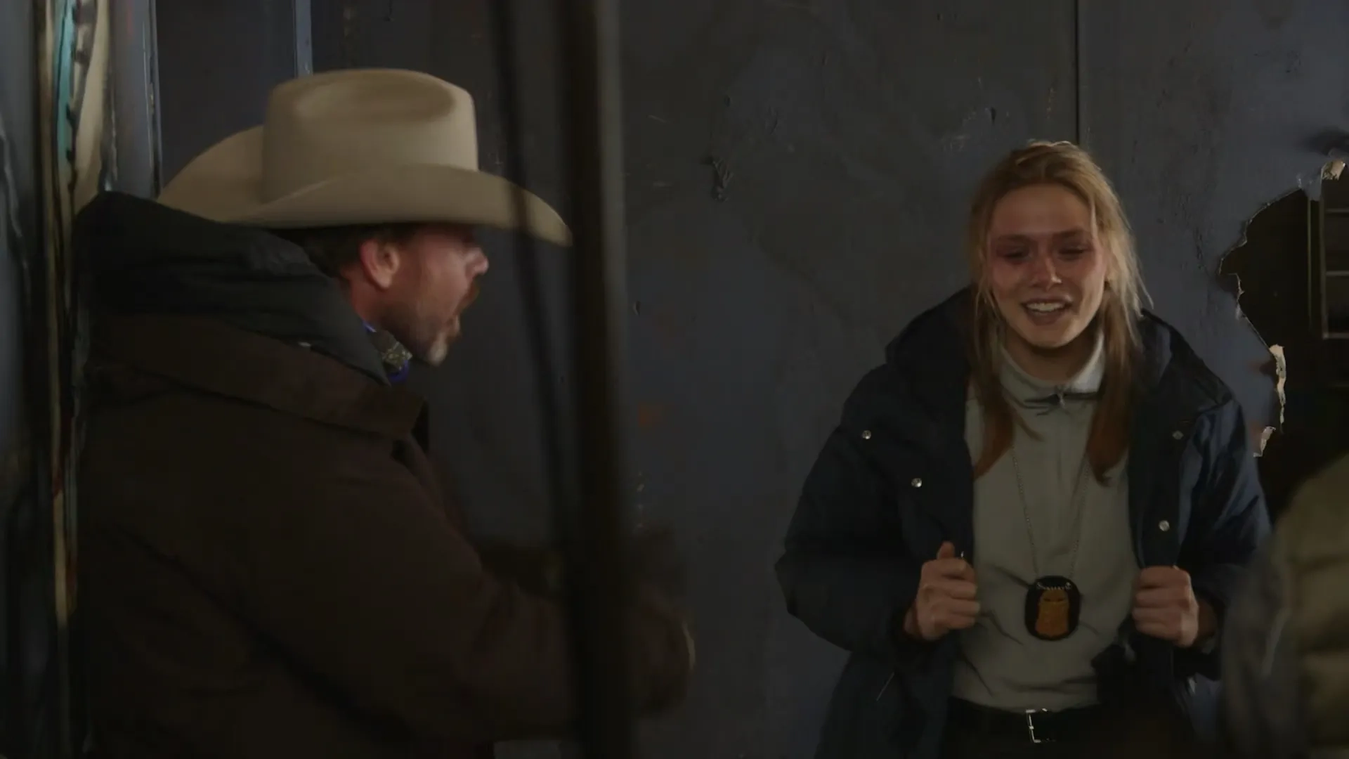 Elizabeth Olsen and Taylor Sheridan in Wind River (2017)