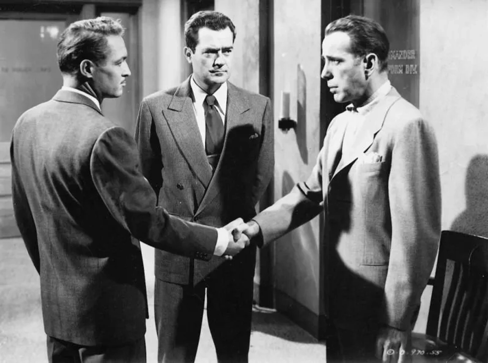 Humphrey Bogart, Frank Lovejoy, and Jack Reynolds in In a Lonely Place (1950)