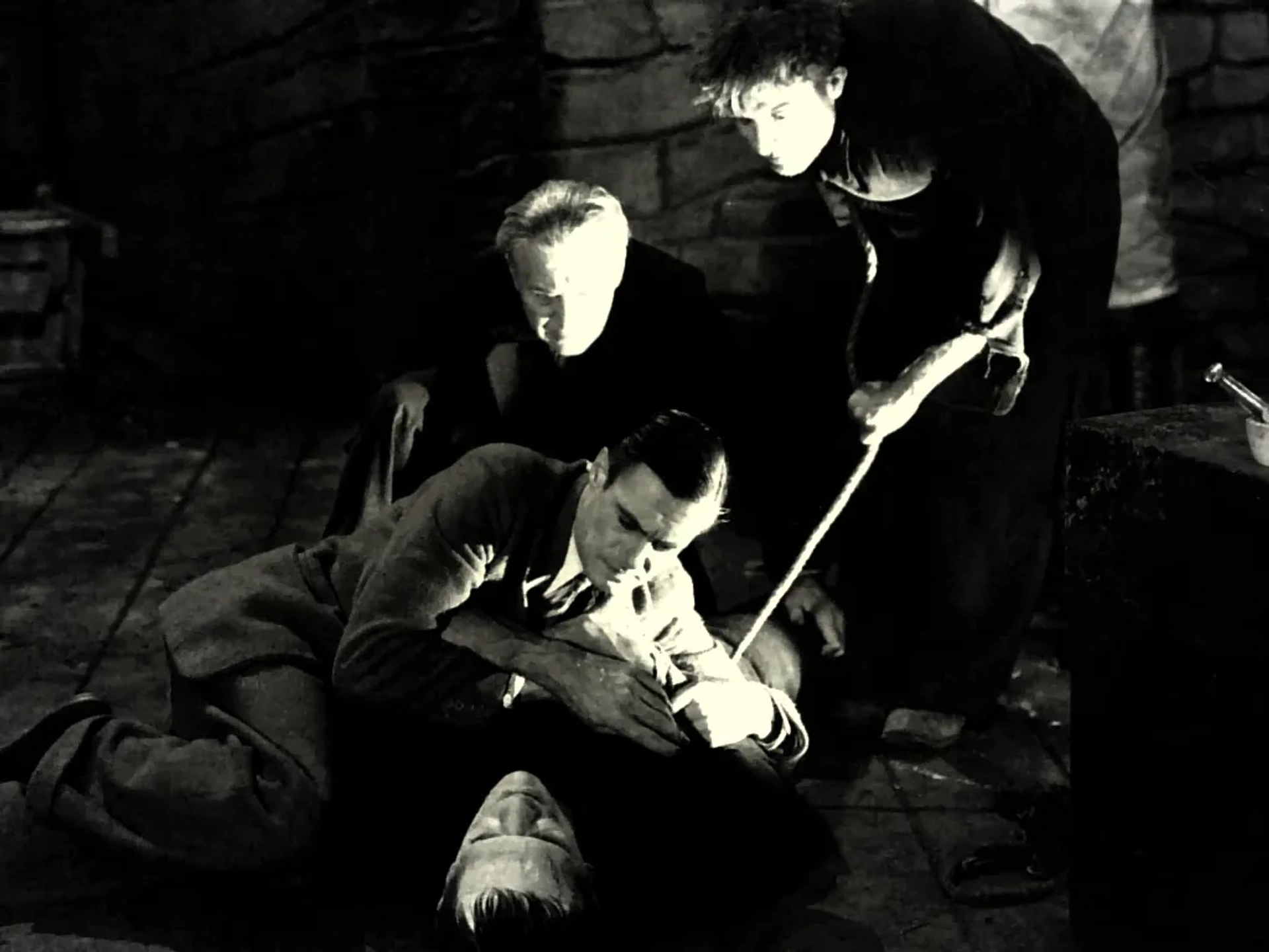 Boris Karloff, Colin Clive, Dwight Frye, and Edward Van Sloan in Frankenstein (1931)
