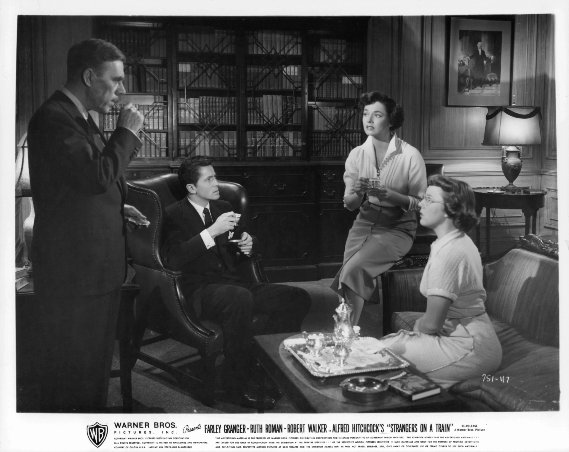 Leo G. Carroll, Farley Granger, Patricia Hitchcock, and Ruth Roman in Strangers on a Train (1951)