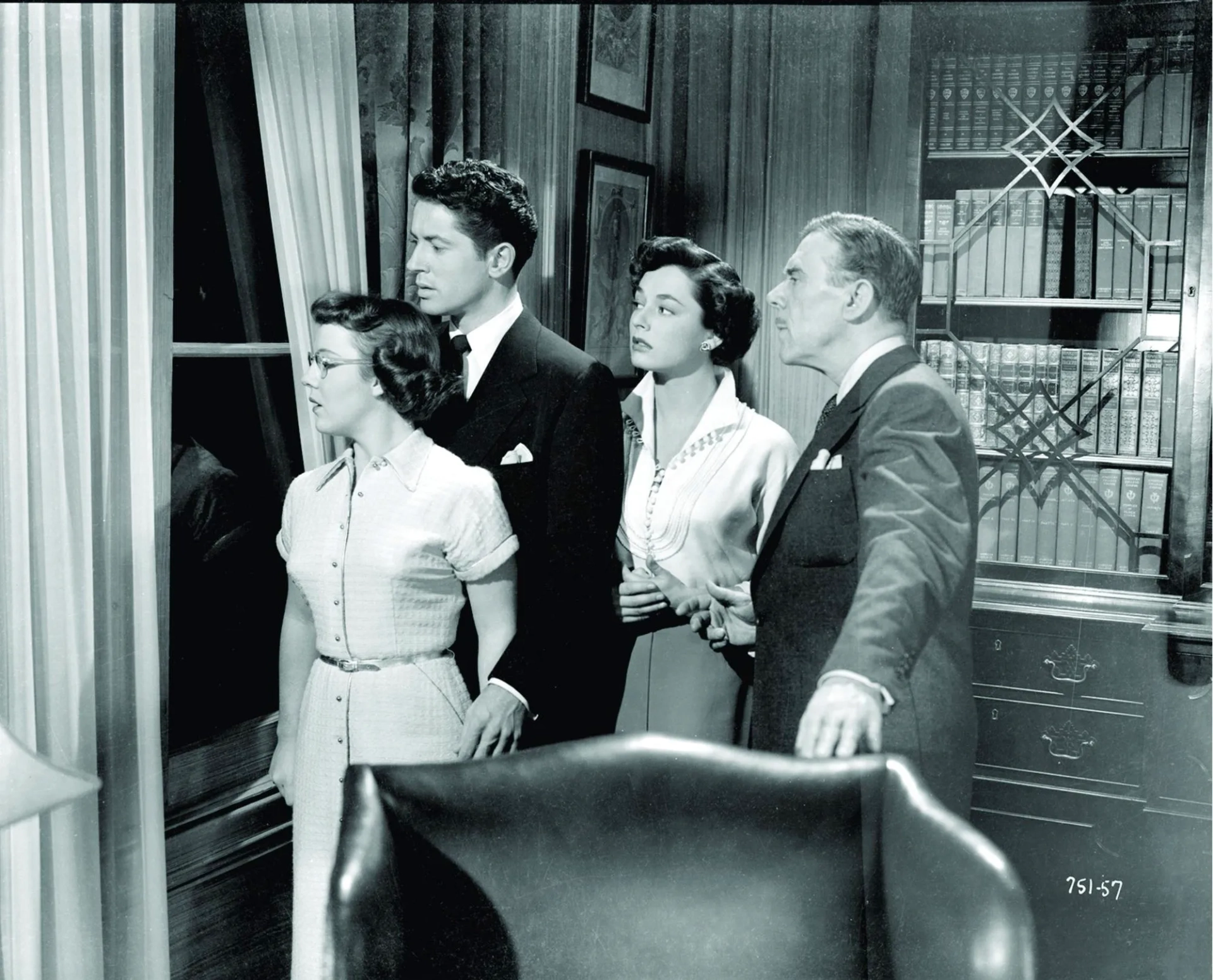 Leo G. Carroll, Farley Granger, Patricia Hitchcock, and Ruth Roman in Strangers on a Train (1951)