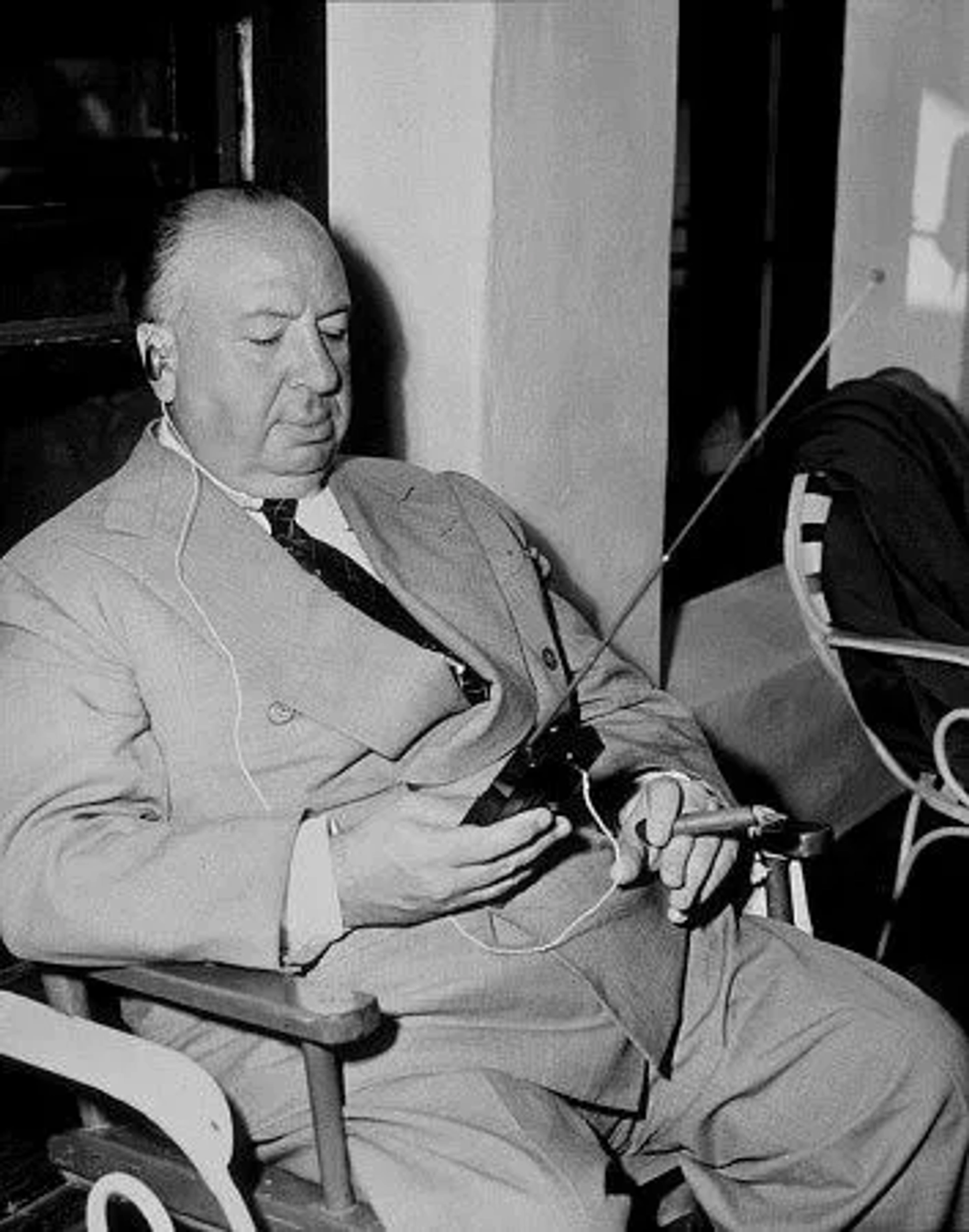 Alfred Hitchcock on teh set of "Strangers on a Train." 1950 Warner Bros.