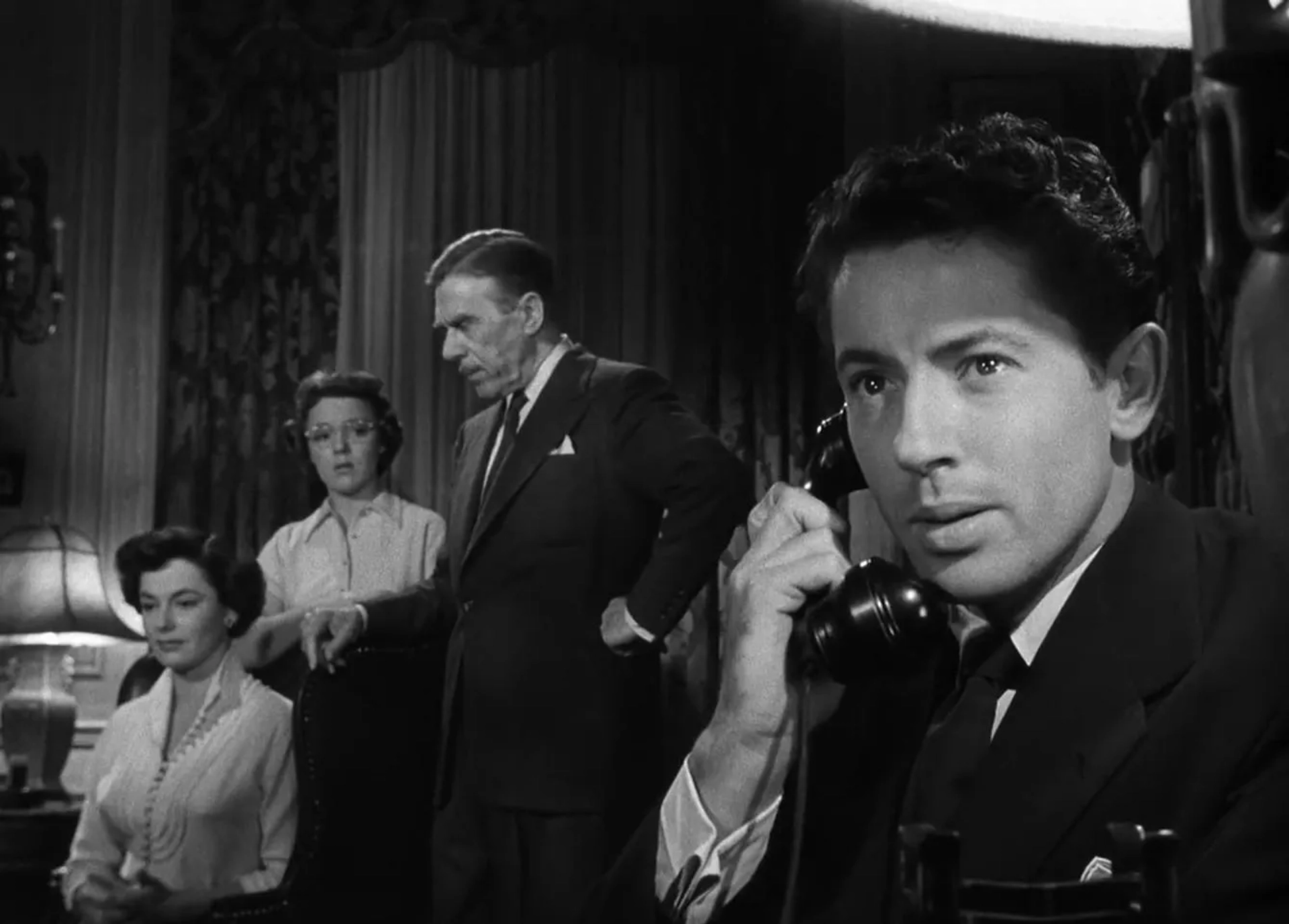 Leo G. Carroll, Farley Granger, Patricia Hitchcock, and Ruth Roman in Strangers on a Train (1951)