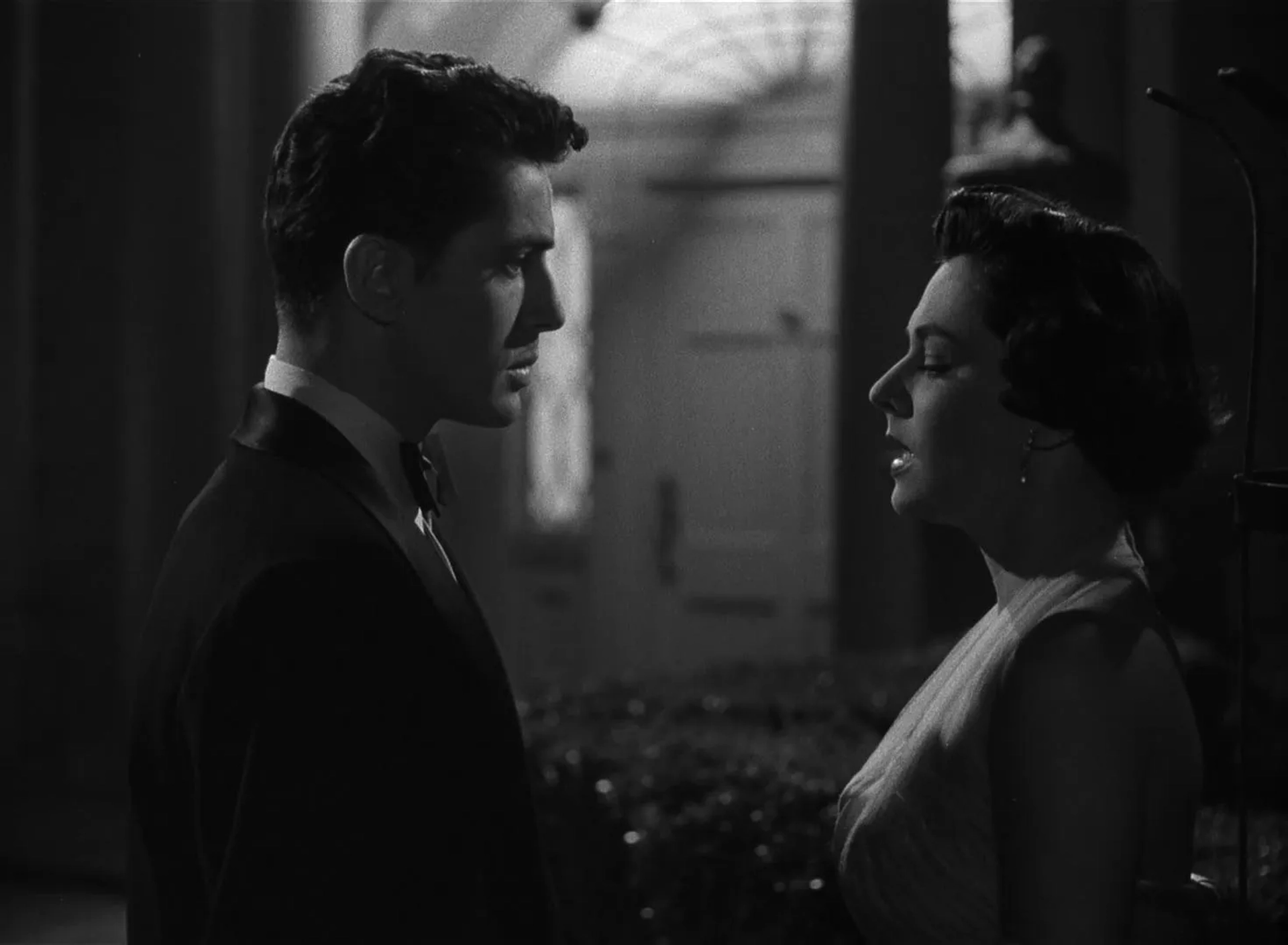 Farley Granger and Ruth Roman in Strangers on a Train (1951)