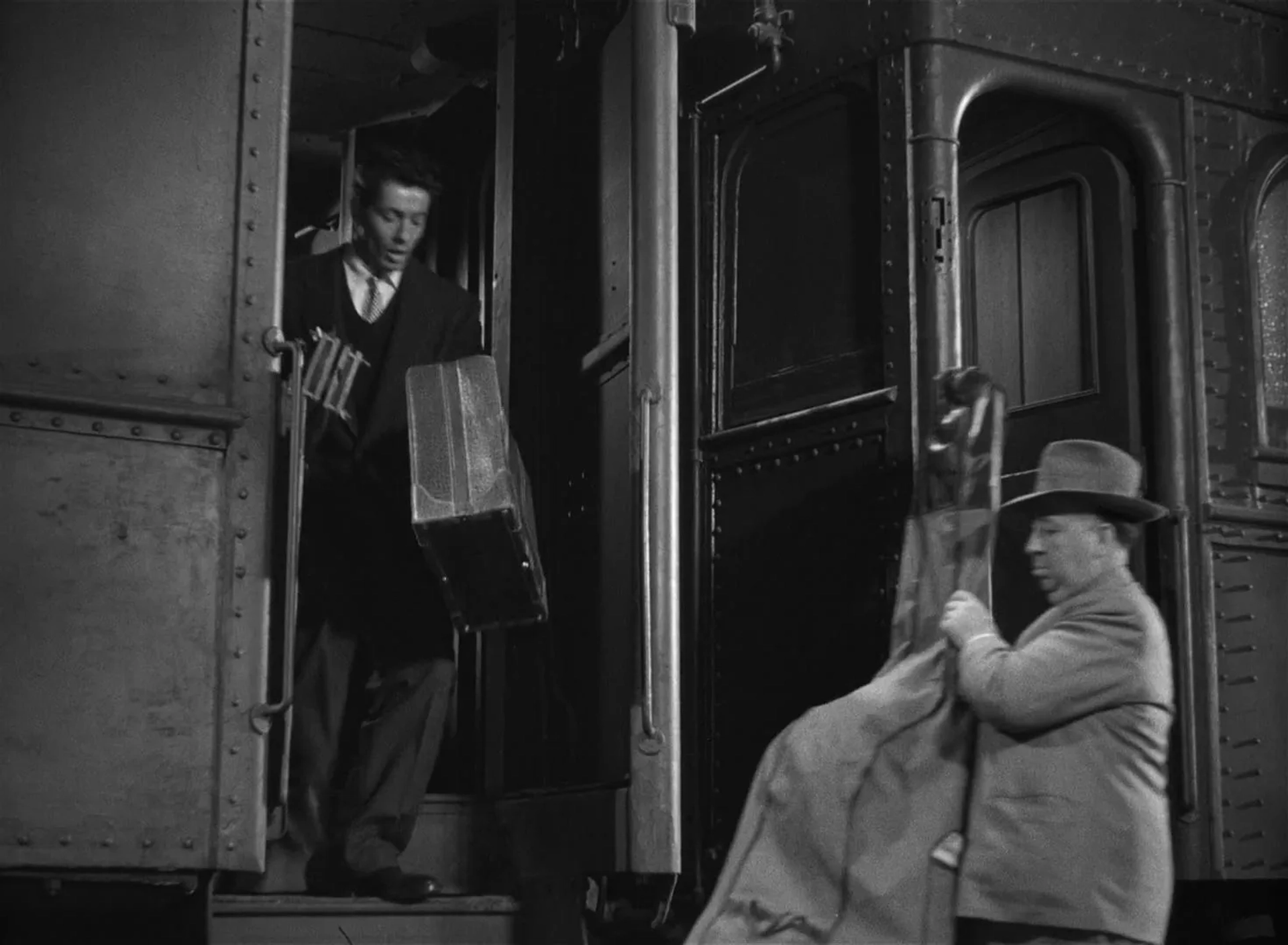 Alfred Hitchcock and Farley Granger in Strangers on a Train (1951)