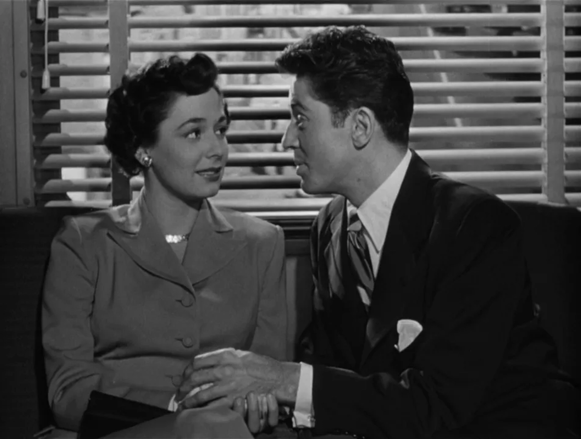 Farley Granger and Ruth Roman in Strangers on a Train (1951)