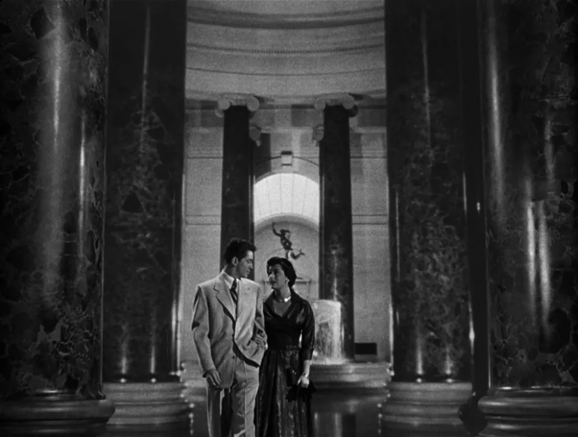 Farley Granger and Ruth Roman in Strangers on a Train (1951)