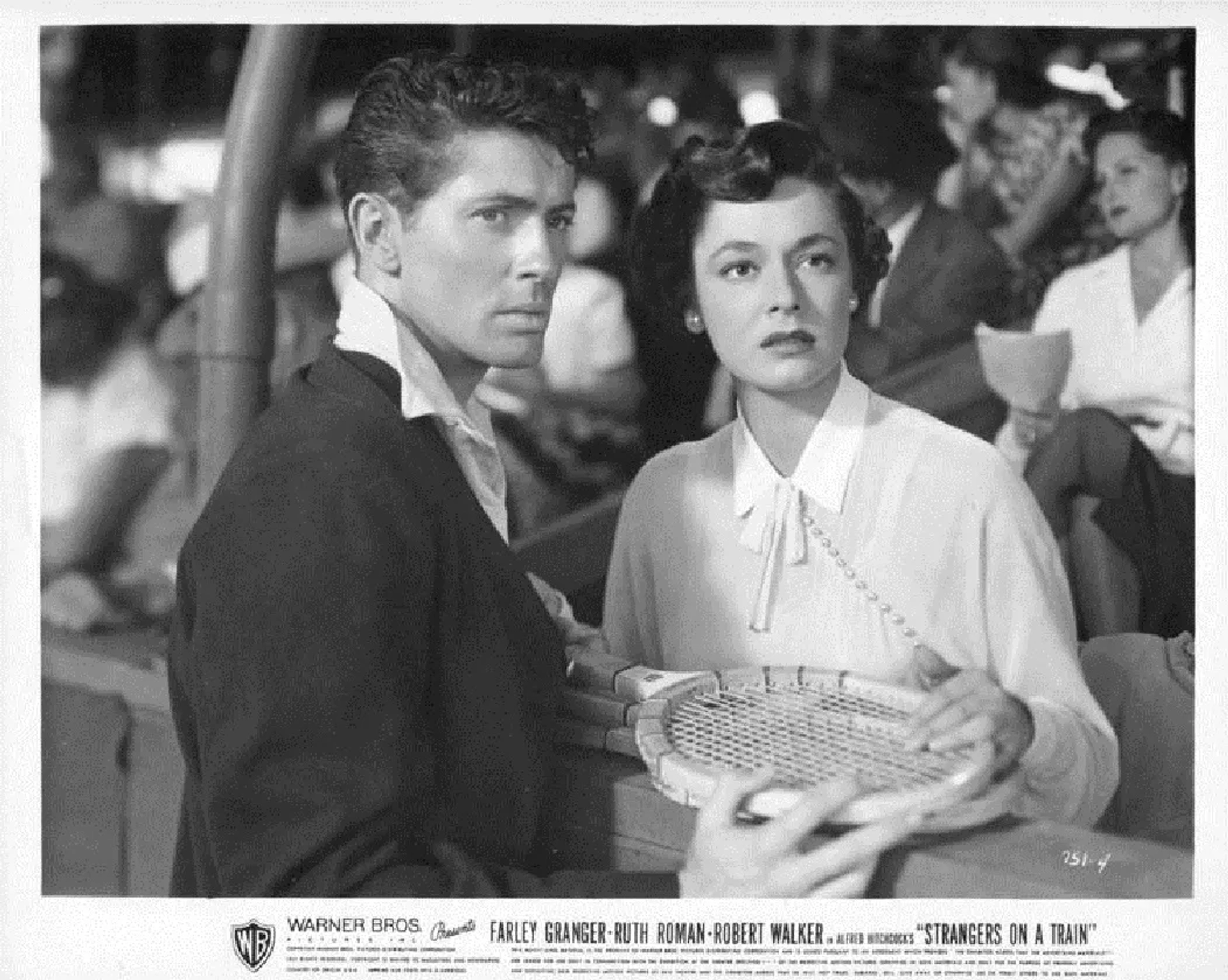 Farley Granger and Ruth Roman in Strangers on a Train (1951)