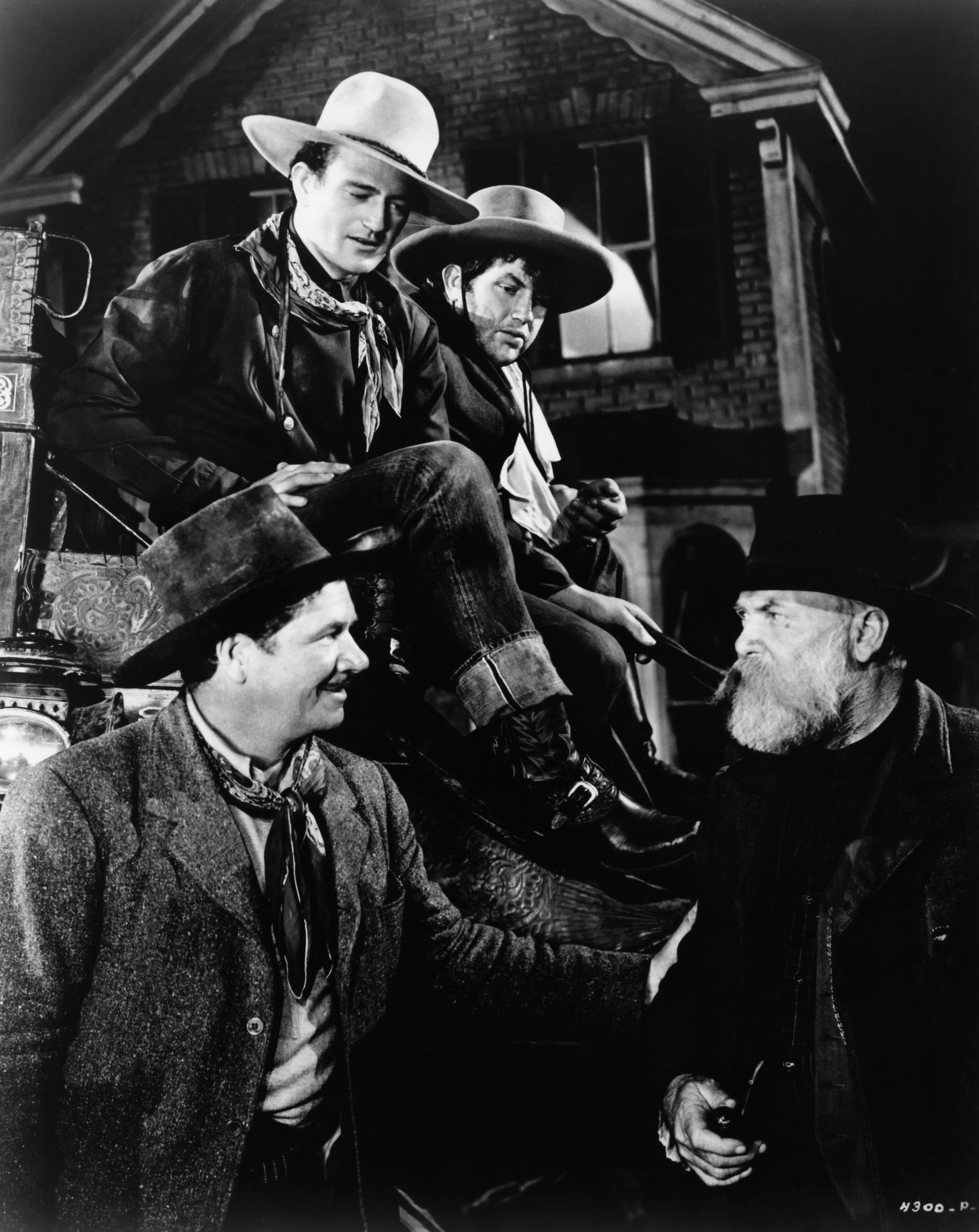 John Wayne, George Bancroft, Andy Devine, and Francis Ford in Stagecoach (1939)