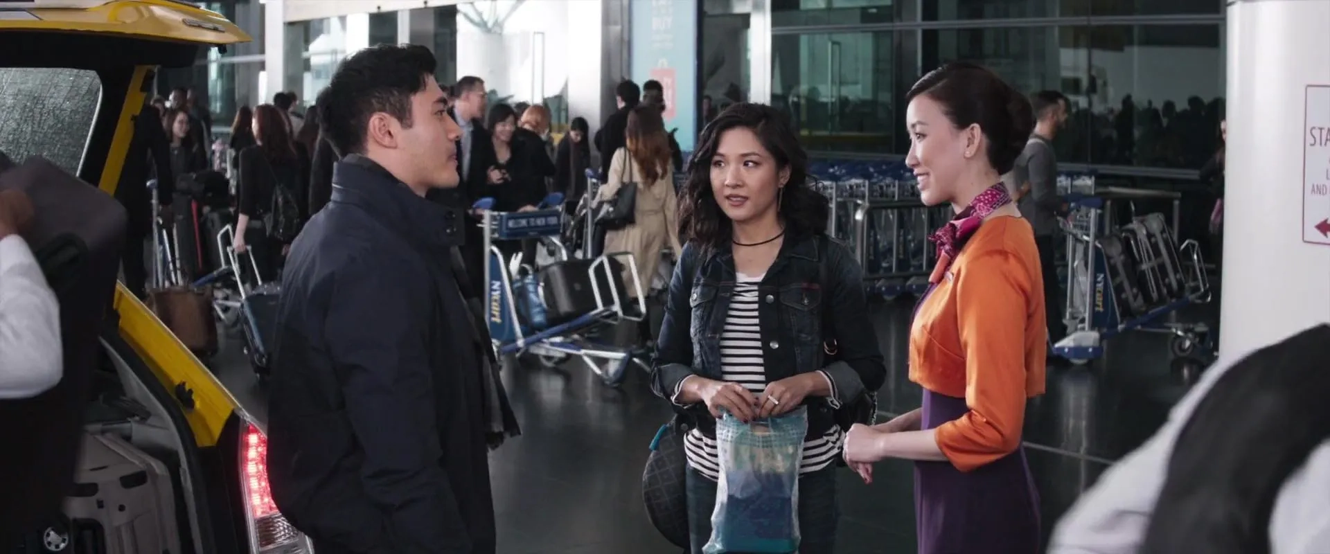 Deborah Yeo, Constance Wu, and Henry Golding in Crazy Rich Asians (2018)