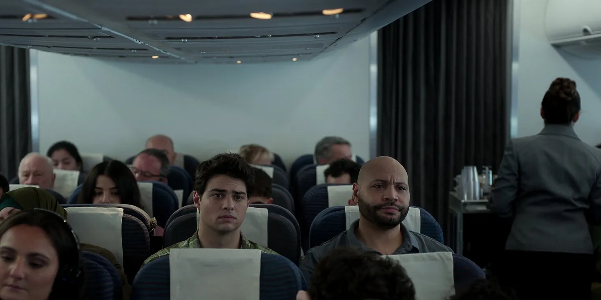 Colton Dunn and Noah Centineo in The Recruit (2022)