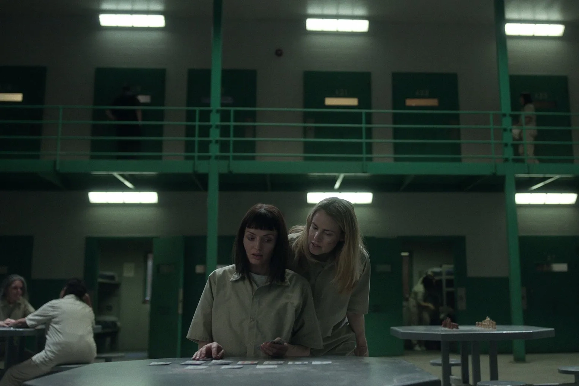 Amanda Schull and Laura Haddock in The Recruit (2022)